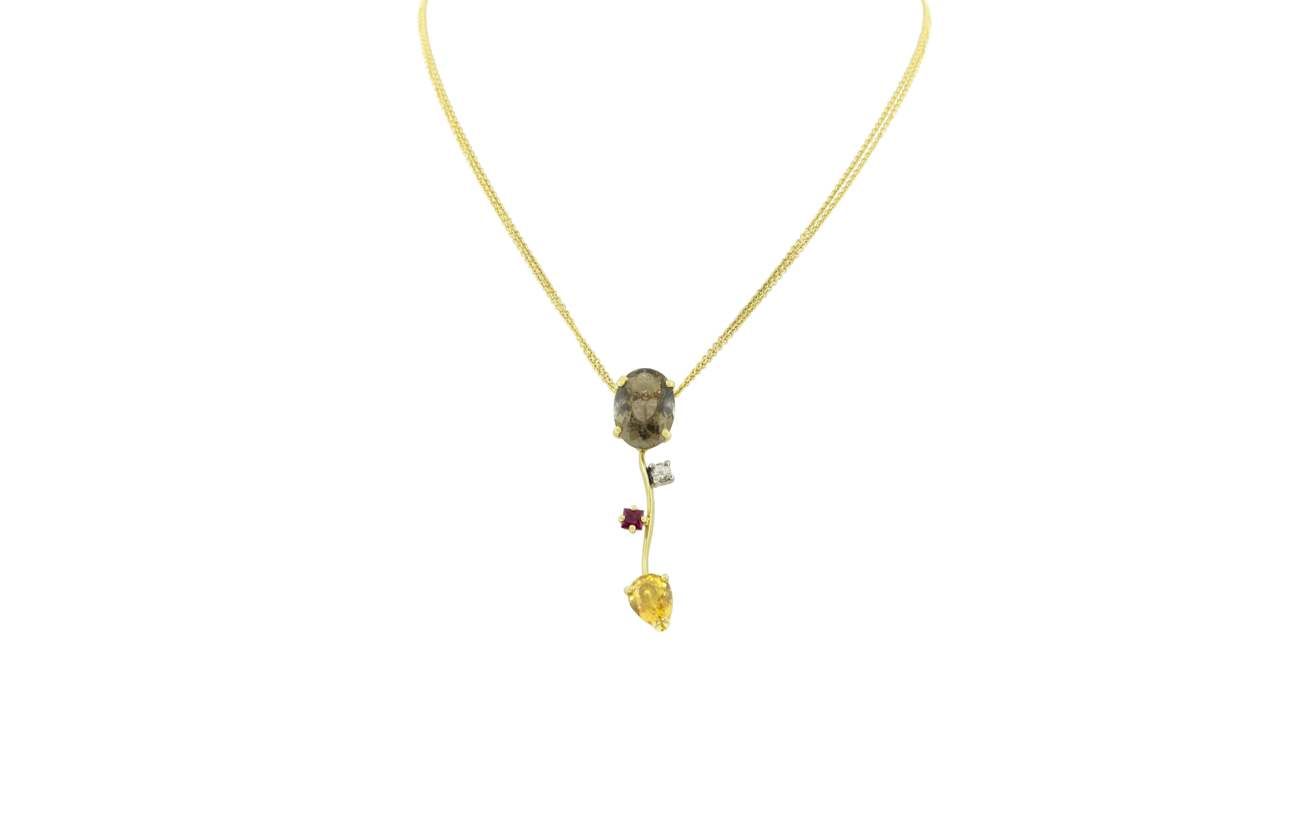 18K yellow gold Ponte Vecchio Gioielli pendant necklace featuring 6.85 carats of quartz, 0.22 carats of rubies, 0.10 carats of round brilliant cut diamonds and adjustable lobster clasp closure. 8.5 grams total weight of 18K gold. Made in Italy.
