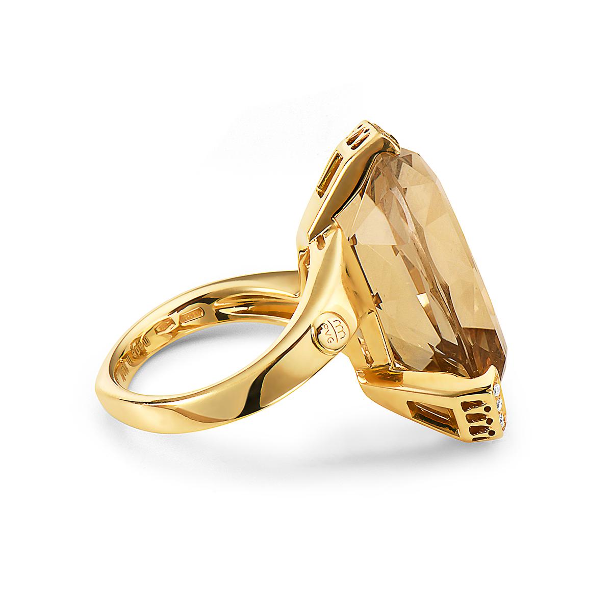 This 18K yellow gold Ponte Vecchio Gioielli cocktail ring features a 26.10 carat faceted pear shape citrine and 0.14 carats of round brilliant cut diamonds. Size 7. Made in Italy. Signed PVG.
Stone Count: 16
Marks: 750, Designer Signature, Maker's