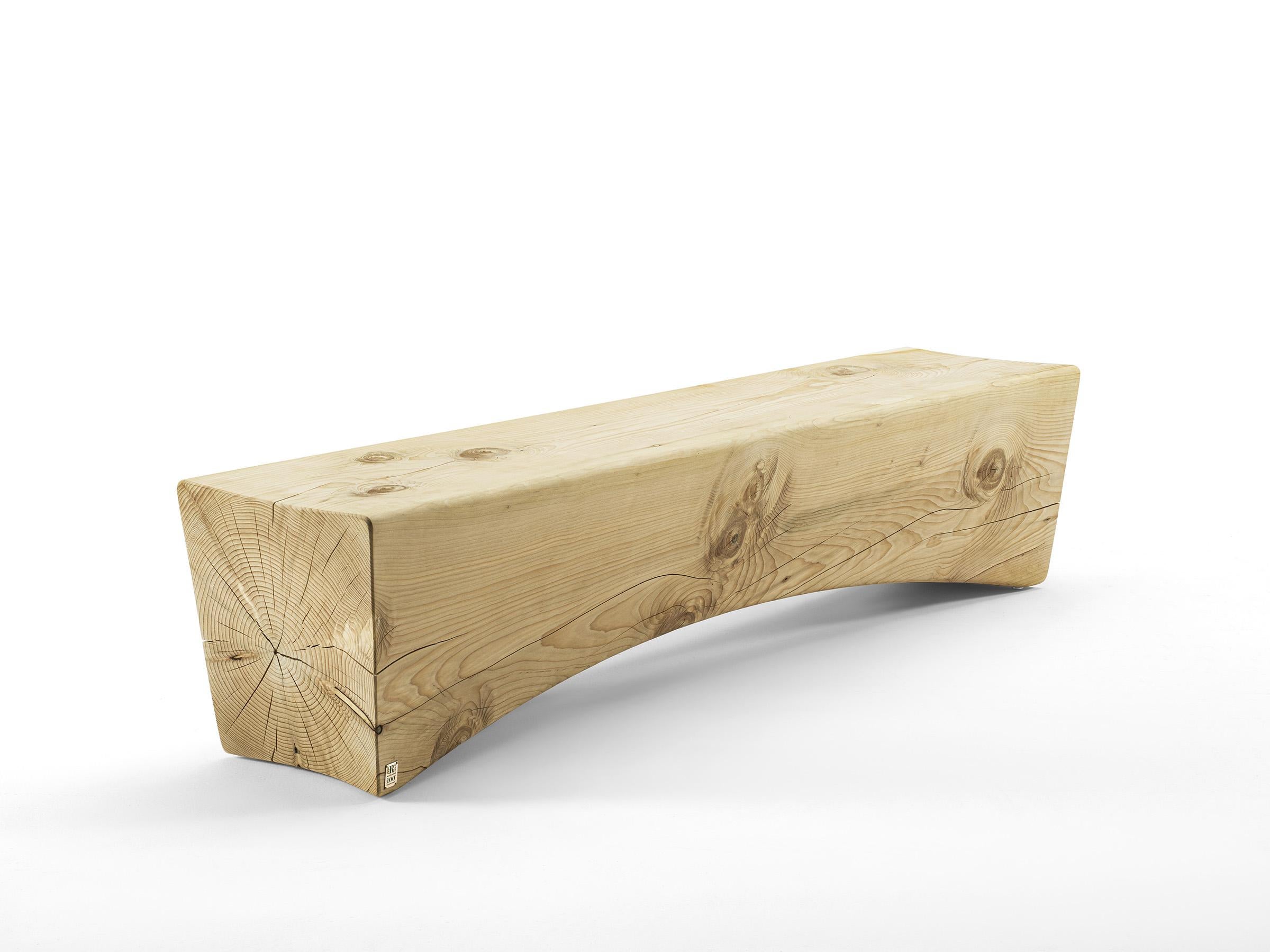 Solid scented cedar wood bench carved from a single block, characterised by a square, linear shape that meets a curved shape below the seating surface, lightening the visual effect.

Designed by Vegni Design and made in Italy

Available in the below