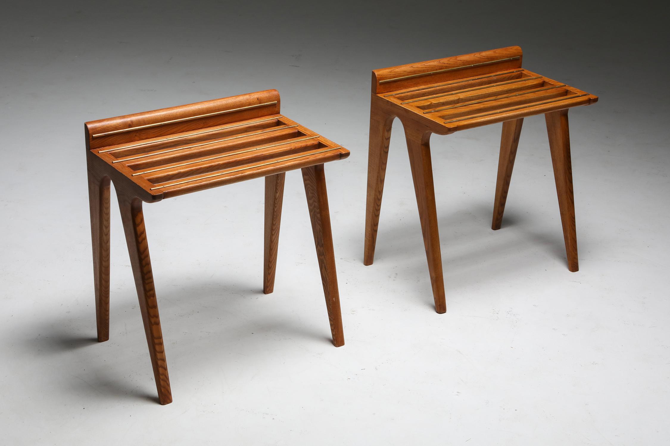 Console tables in oak and brass, style of Gio Ponti, circa 1958

Rare set of suitcase holders
Designed for Hotel Parco in Sorrento

Gio Ponti (1891-1979) was trained as an architect but was also a poet, a painter, a designer of exhibitions, glass,