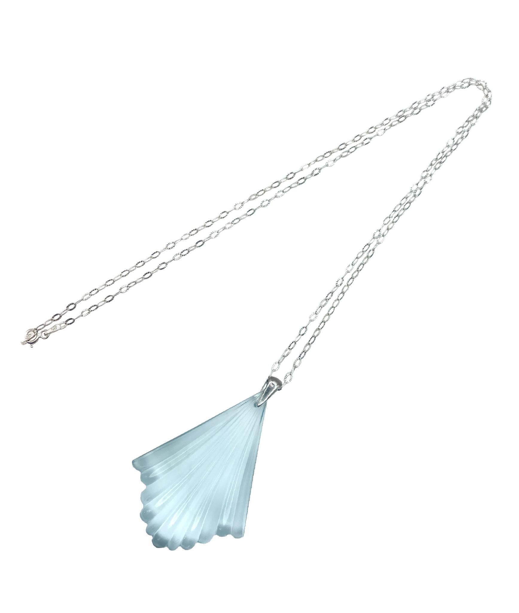 This Art Deco molded transparent aqua glass fan pendant is from 1930s Czech Republic. 

A tribute to the bygone era of the 30's, the Deco fan symbolized power amongst pharaohs and royalty. This classic fan pattern is found in Art Deco architecture,