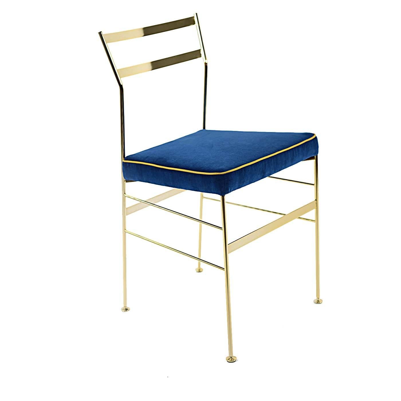 Handmade and elegant, this chair is a stunning addition to a modern interior, thanks to its Minimalist design, the striking color combination, and the precious materials used. The iron structure, with galvanized feet at the base, boasts a 24-karat