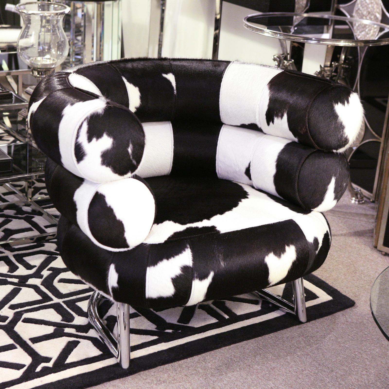 Pony Bibendum 2 armchair black and white,
covered with treated natural cowhide,
on polished stainless steel base.
Exceptional piece.