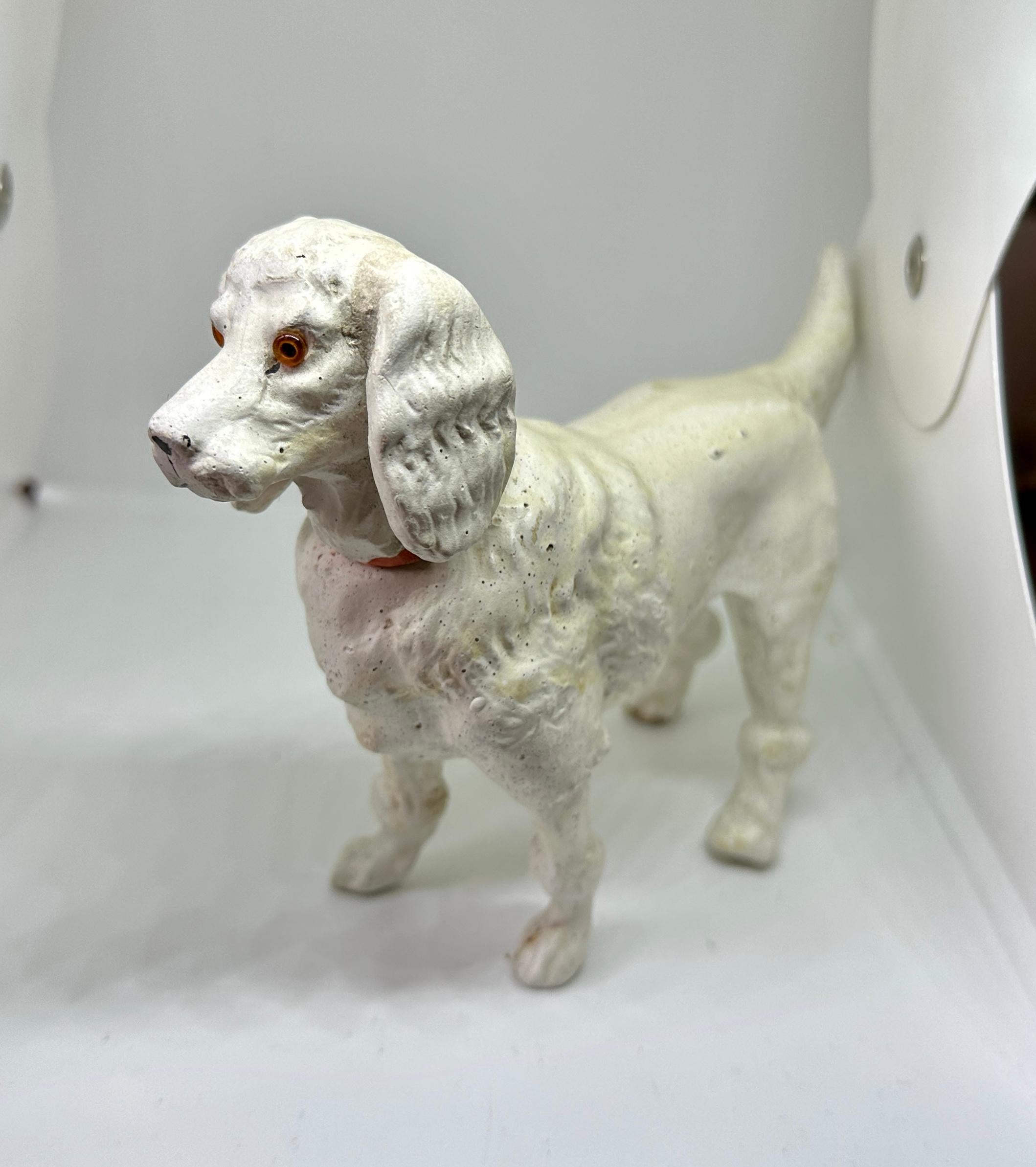THIS IS A VERY RARE EARLY GERMAN CANDY CONTAINER OF A LARGE SIZE WHITE POODLE DOG.  THE POODE IS ABSOLUTELY FABULOUS AND A VERY RARE EARLY CANDY CONTAINER.  THE POODLE HAS GLASS EYES - SO ADORABLE!  THIS IS AN ORIGINAL ANTIQUE CANDY CONTAINER DATING