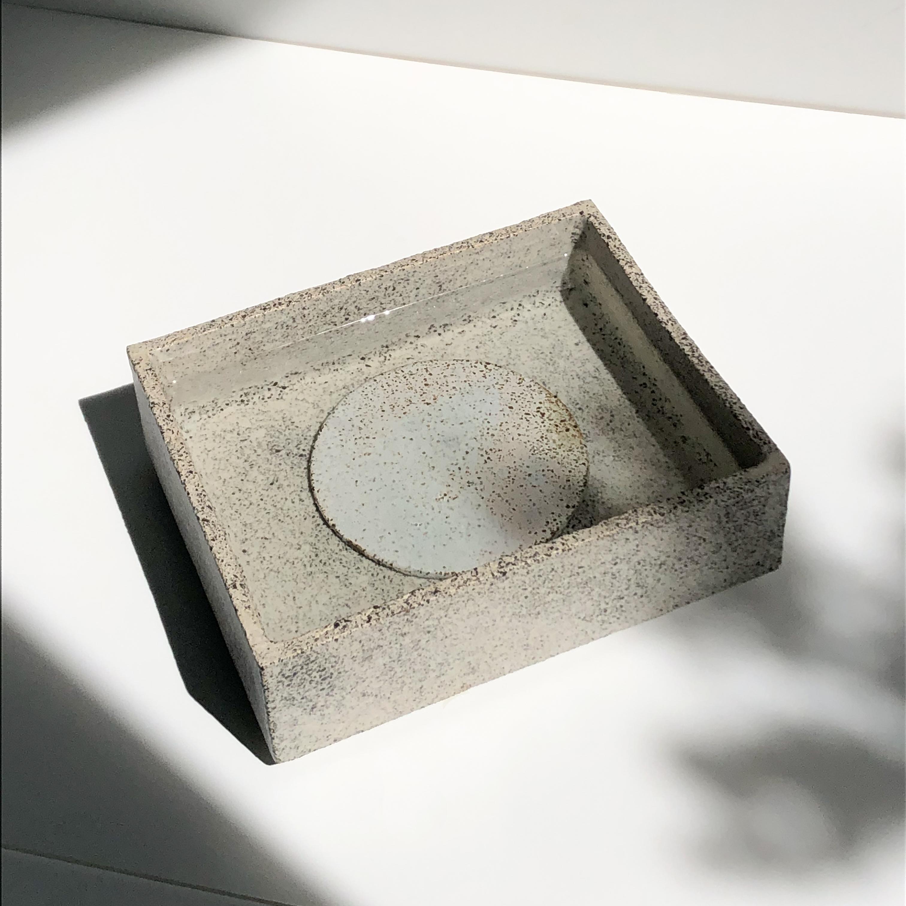 Pool I box by Wendy Taylor
Dimensions: D 17.7 x W 7.4 x H 22.4 cm
Materials: stoneware, glazed

2 pieces, box and disc - can be used with flowerfrog for ikebana.
Stoneware, glazed exterior, interior. Glaze color/ surface pattern may
vary.