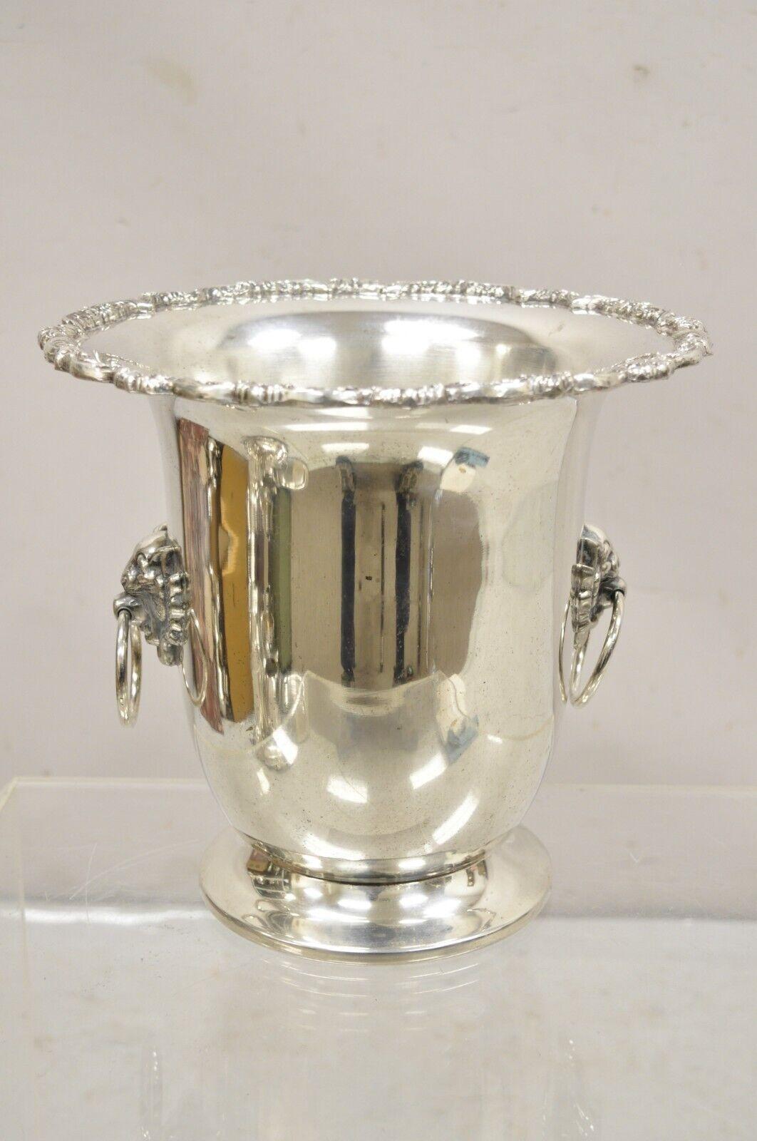 Vintage Poole Silver Regency Style Silver Plated Lion Head Fluted Champagne Ice Bucket. Circa 1960s. Measurements:  9.5