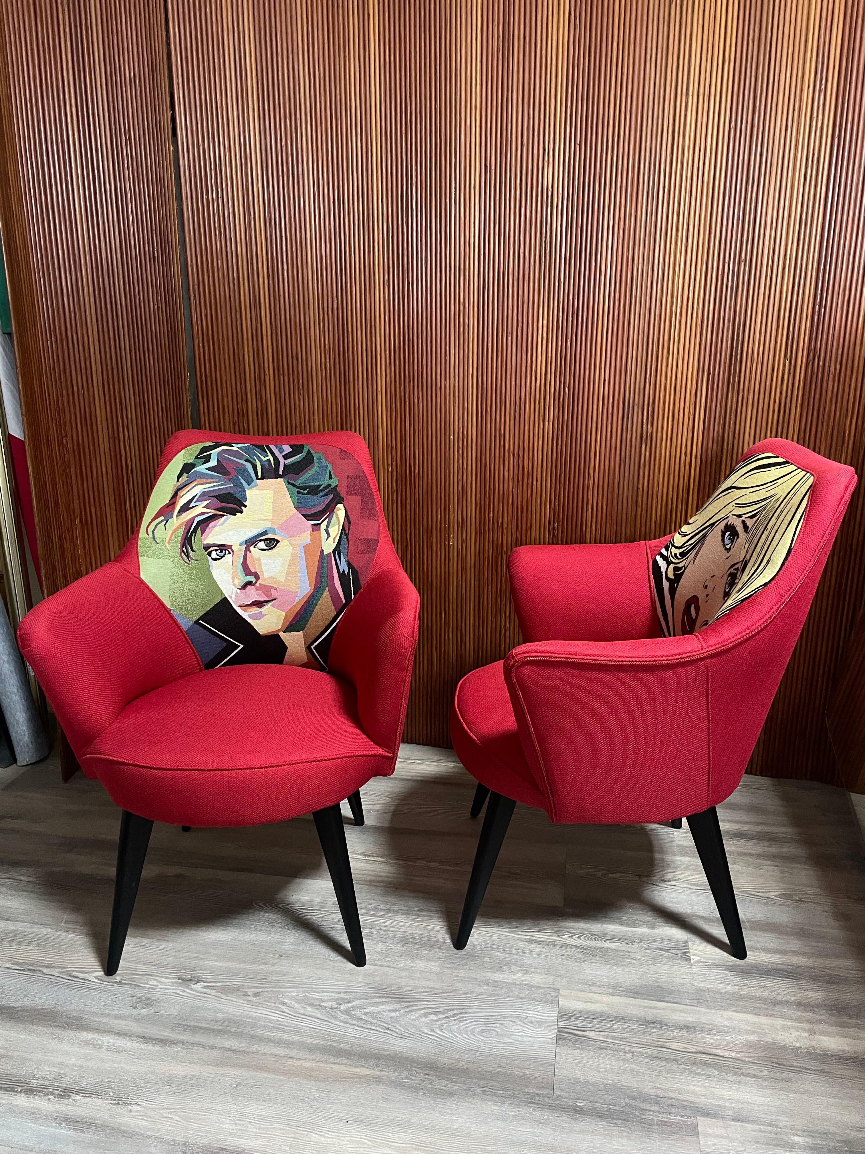 Original 1950s armchairs with squared leg in painted wood.

The upholstery of the armchairs has been recently redone while maintaining the original character given by the backrests in which two pop-art icons are depicted.