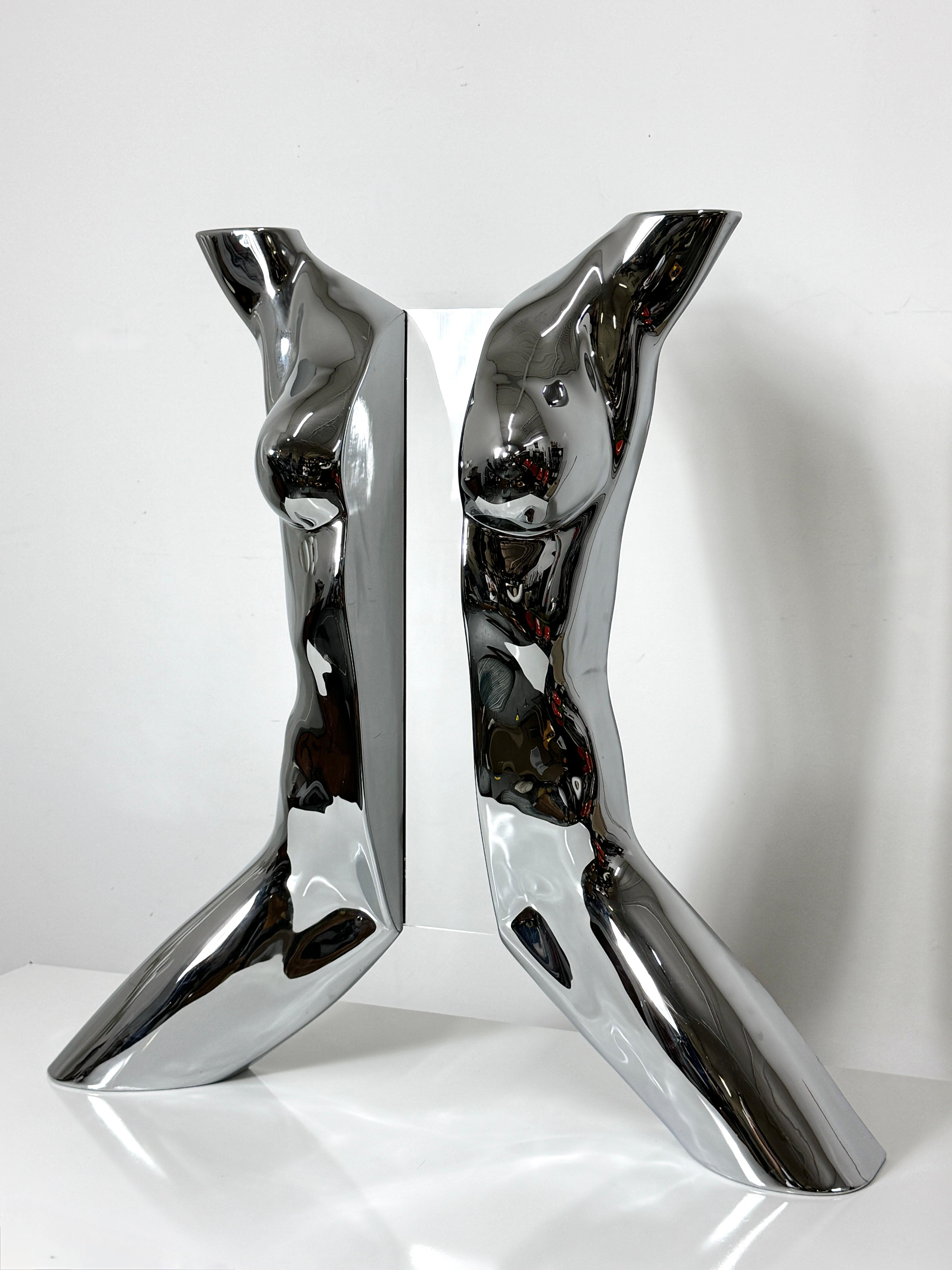 Sandro Bocola (1931-2022)
Nude 1970
Edition of 500 published by Xartcollection

Chromed plexiglass nude female split torso with clear center acrylic panel
Signed and numbered to reverse
Designed for placement as a freestanding sculpture or wall