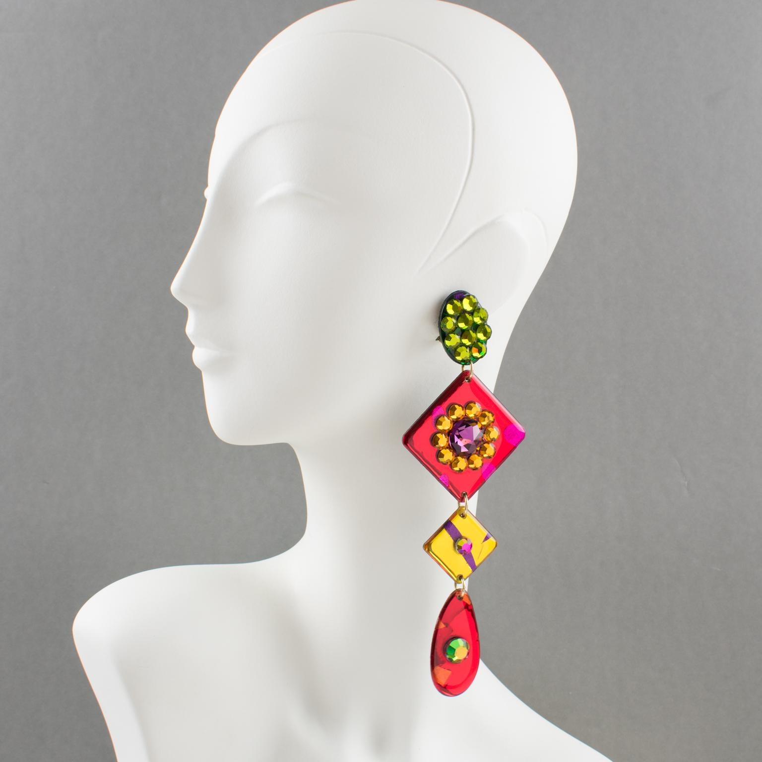 Do you think you have seen extra-long shoulder duster earrings? Well, check out these!
Spectacular Italian designer studio Lucite or Resin dangling clip-on earrings. The extra-long shoulder-duster design boasts a geometric shape with drop, oval,