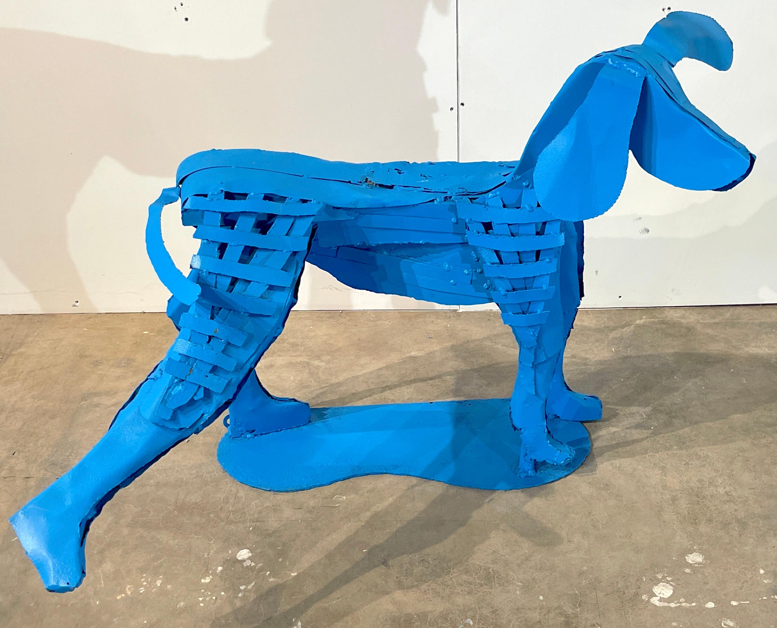 Pop Art Garden Fountain/ sculpture of a standing blue dog 
USA, circa 1980s

Definitely an amusing and whimsical garden (can be used indoors) fountain/sculpture, The well executed sculpture of a canine with one leg lifted. It has the option to