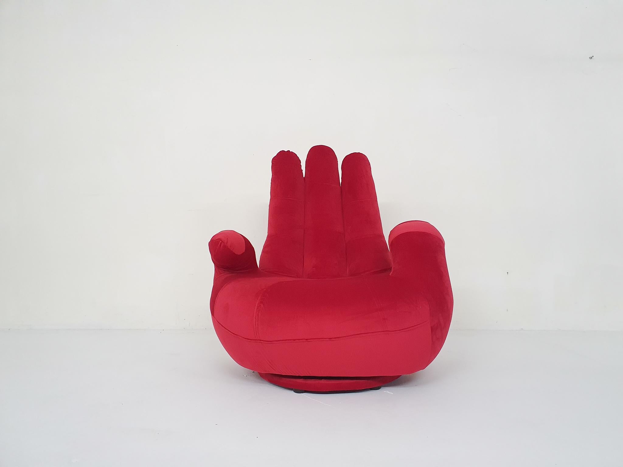 Vintage swivel lounge chair re-upholstered in red velvet.