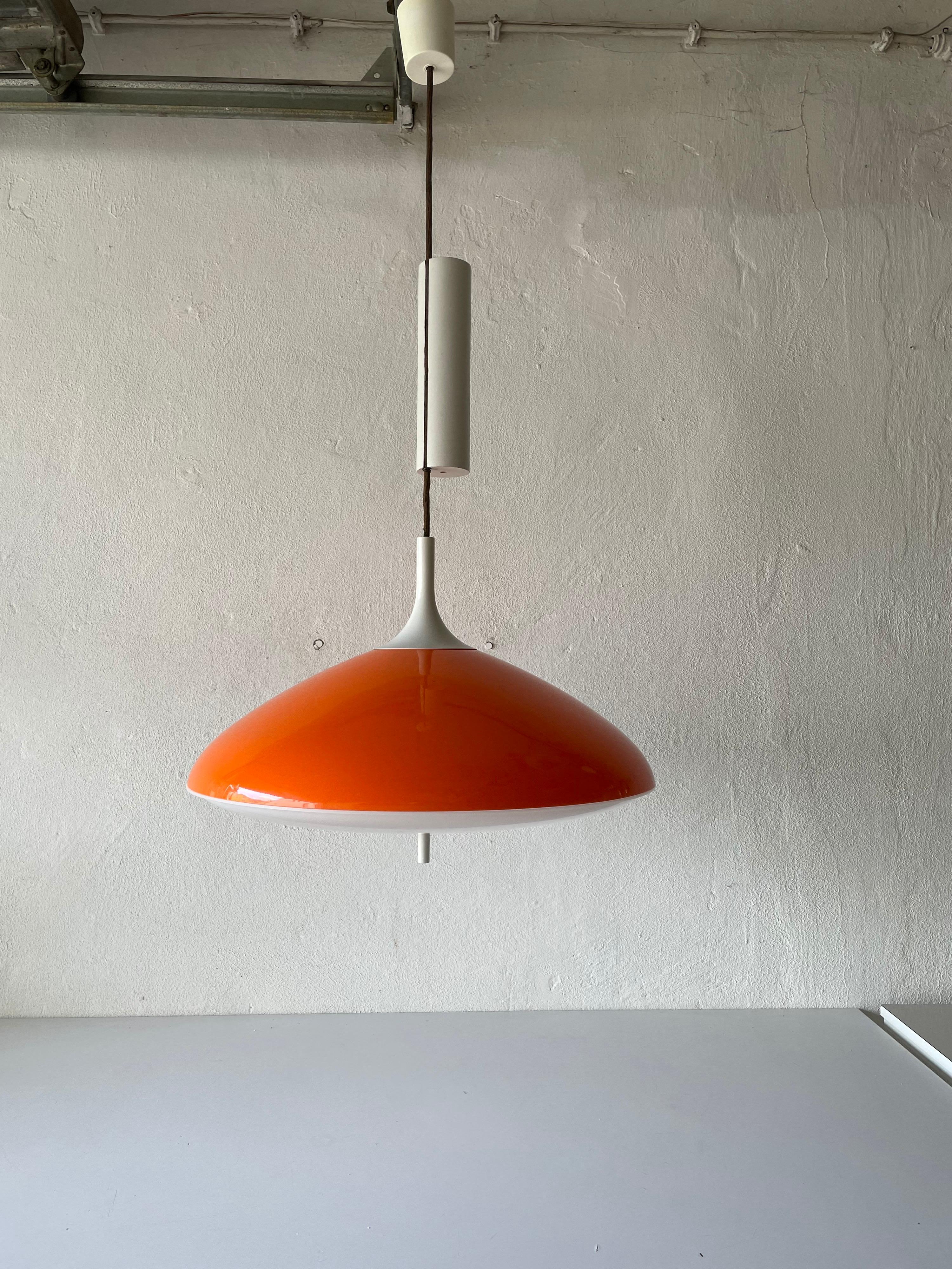Pop art large orange ceiling lamp by Temde, 1960s, Switzerland

Lampshade is in very good vintage condition.
Part on the middle made of wood

This lamp works with E27 light bulb. Max 100W
Wired and suitable to use with 220V and 110V for all