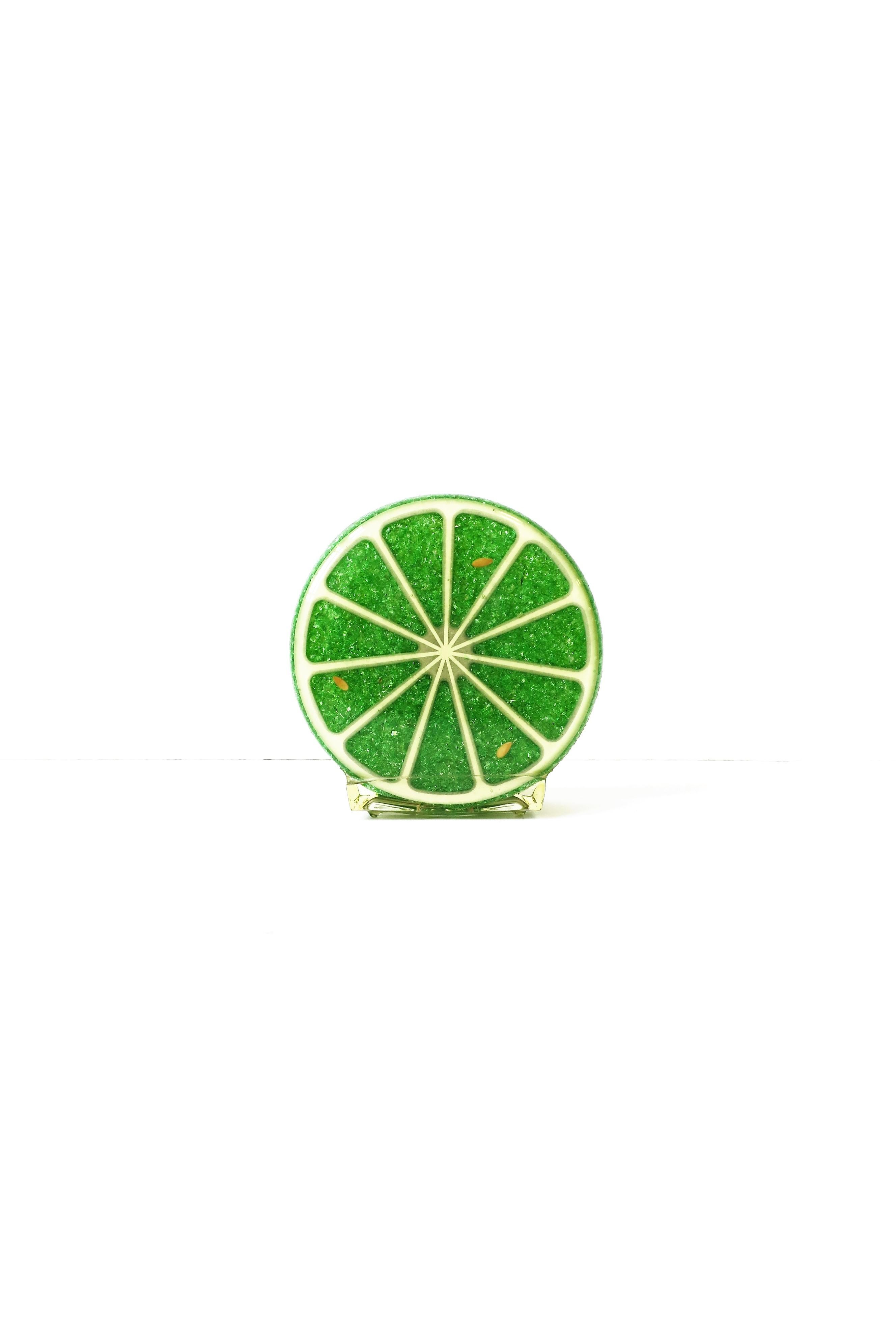 A Pop Art lime green lime fruit napkin or desk letter holder, ca. 1960s, USA. Label reads that item is both a 