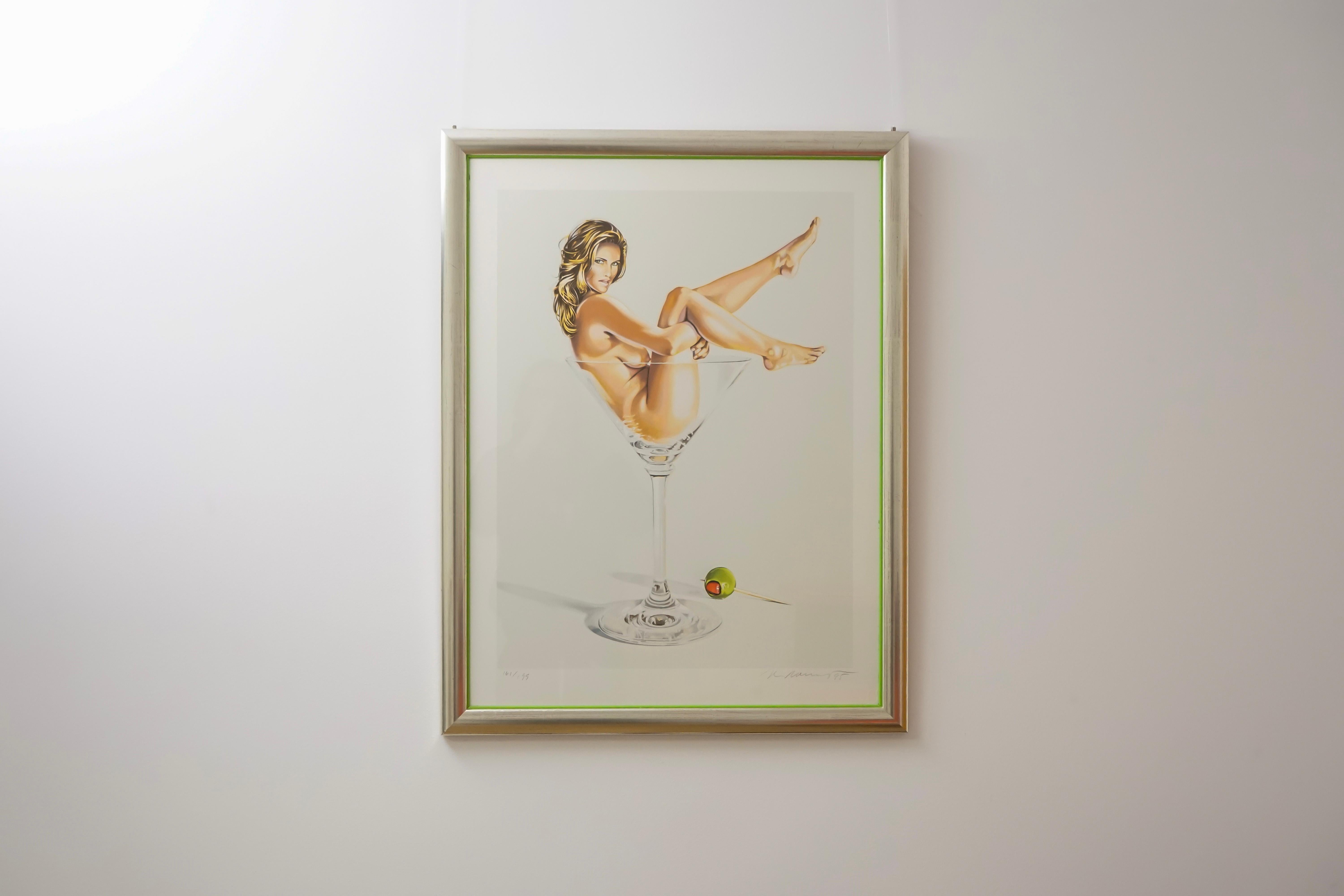 Artistics : Mel Ramos (1935 - 2018)
Titre : Martini Miss 
Signé : en bas à droite au crayon
Daté : en bas à droite au crayon (19)95
N° / Édition : 161 de 199
Dimensions avec cadre : 64 x 82 x 2,3 cm
Technique : Lithographie en couleurs