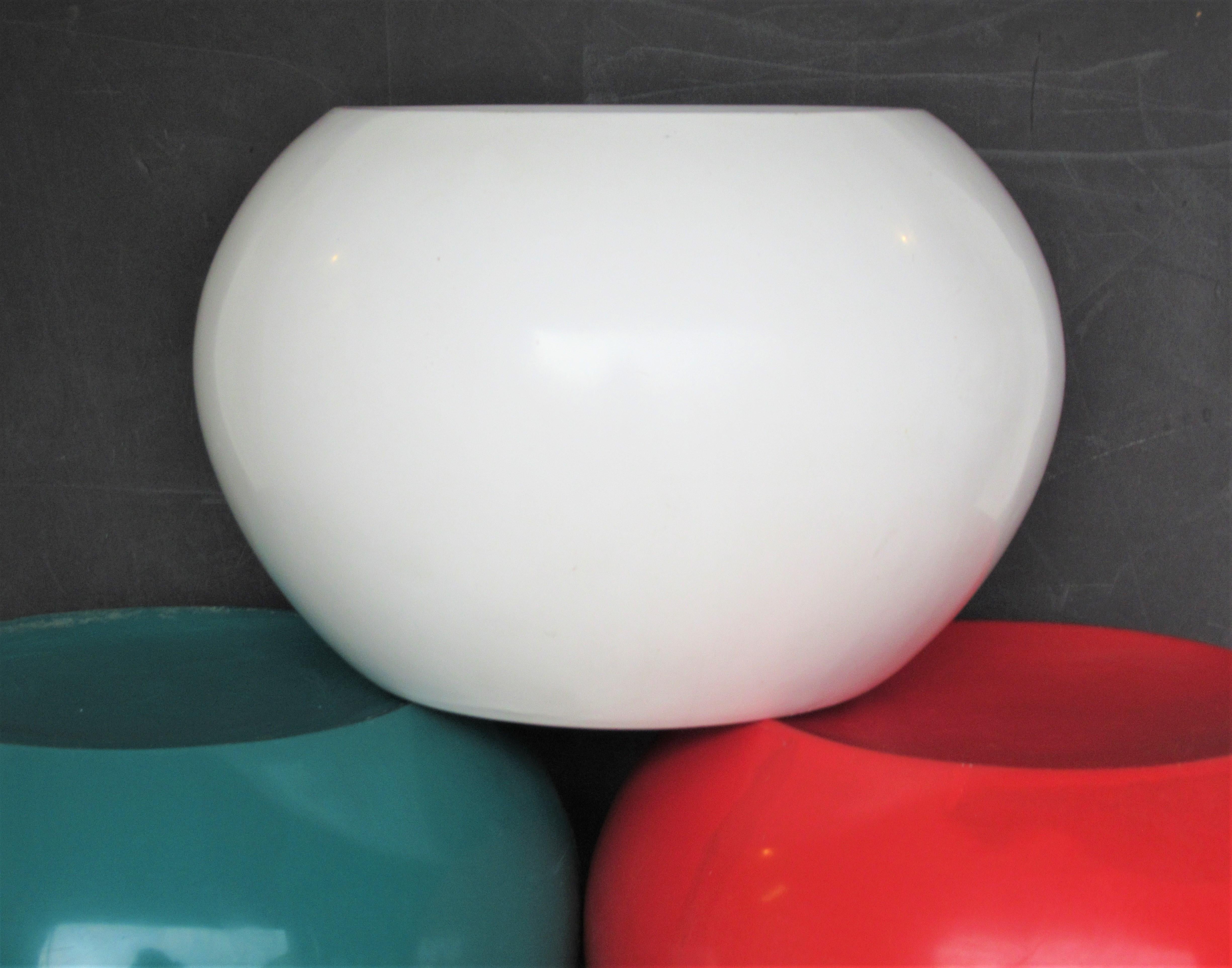Three unusual mod pop art style dish topped molding plastic stacking spheres (red white green) in the style of Panton / Aarnio. These can be used as poufs / stools / low tables / sculptural objects. Look at all pictures and read condition report in