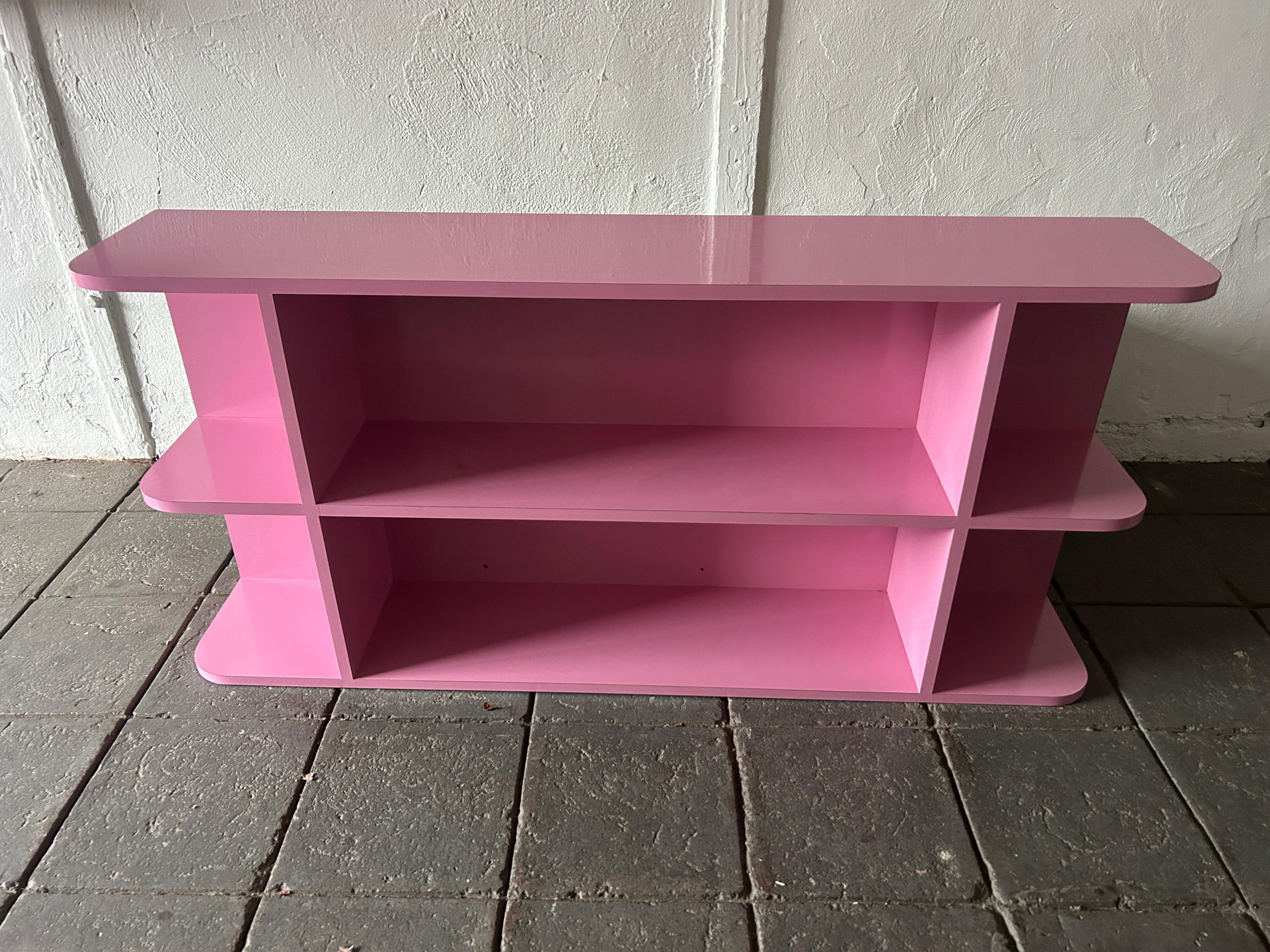 Beautiful post modern custom made bubblegum pink gloss laminate floating wall mounted shelf unit, circa 1980. Very clean inside and out almost like new. Look at photos. Can be used as a console or entry way table Great for home, office, art