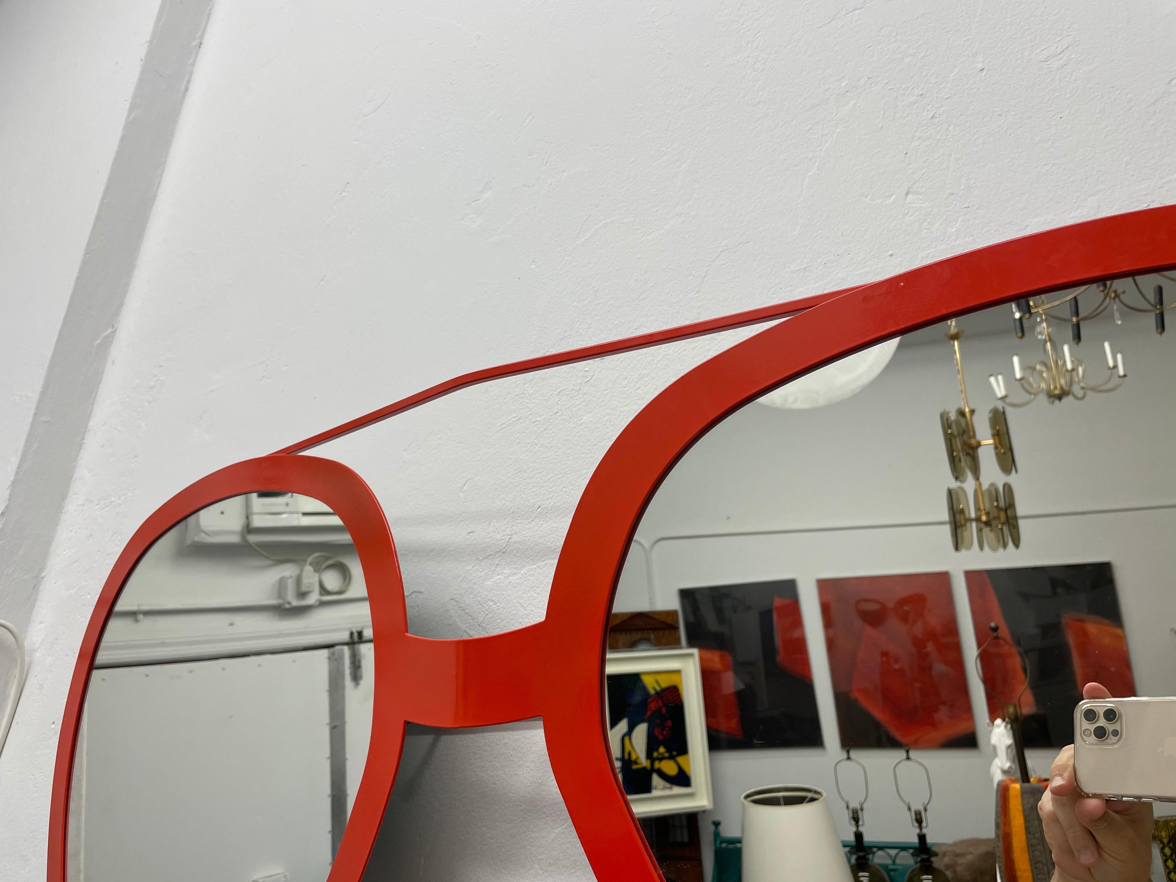 This is out of this world - so cool and fun in this vibrant orange powder-coated frame with mirror inserts makes for an awesome accent to a foyer, powder-room or kids room. The Aviator style sunglasses with mirror lenses are a perfect statement