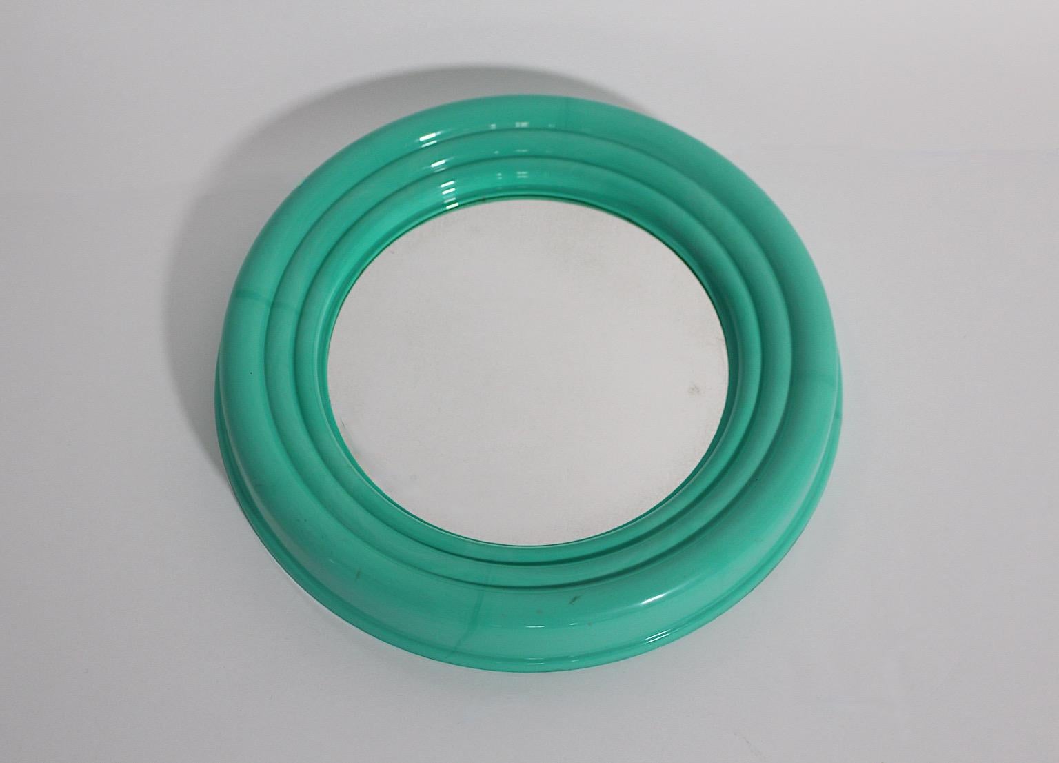 Post-Modern Pop Art Style Green Teal Circular Plastic Wall Mirror 1990s Italy For Sale