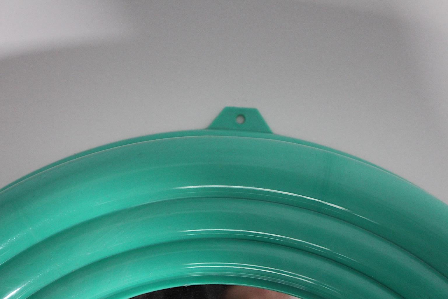 Late 20th Century Pop Art Style Green Teal Circular Plastic Wall Mirror 1990s Italy For Sale
