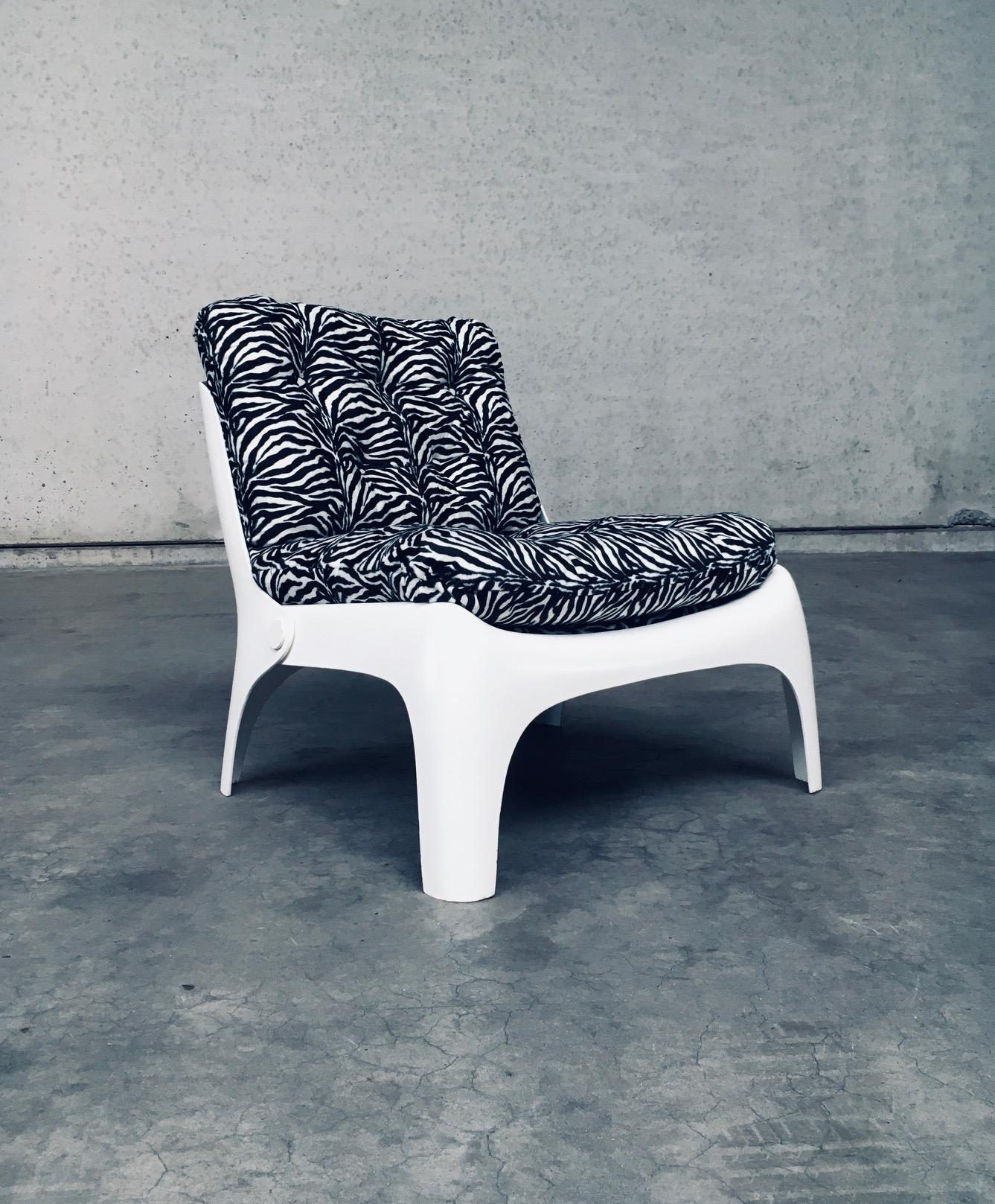 Vintage Space Age Pop Culture Design Lounge Chair by Carl Straub. Made in Germany, 1960's - 70's period. No maker markings. This is a RARE model chair with beautiful and strong design. Made from 2 moulded white fiberglass parts and has new