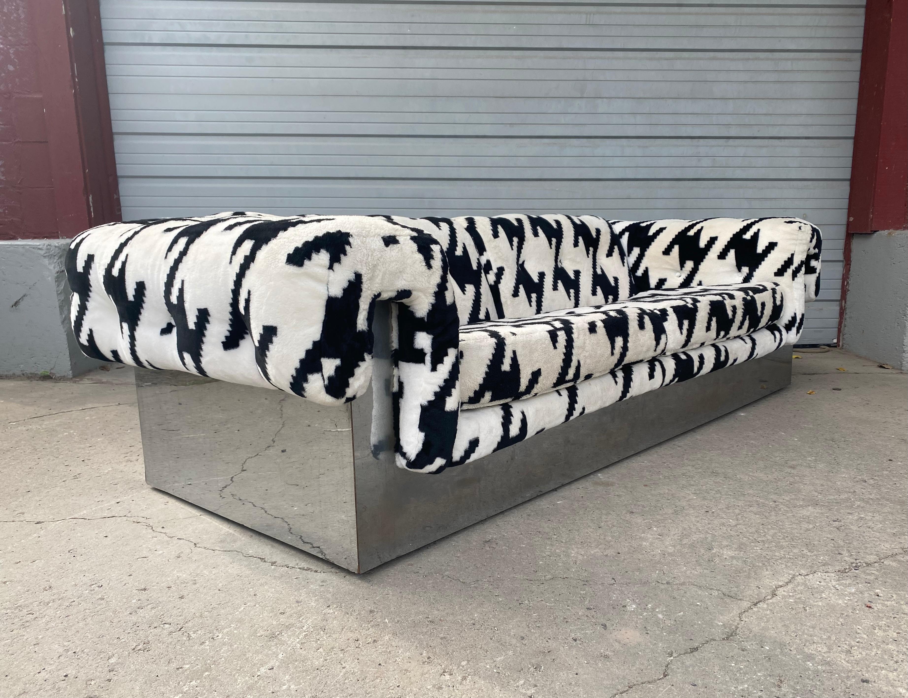 Outrageous Pop modern button tufted sofa designed by Milo Baughman for Thayer Coggin, Chrome wraps entire base and forms support for the button-tufted arms and back. Elegant from every angle-his best sofa design. Retains original hounds-tooth (flame