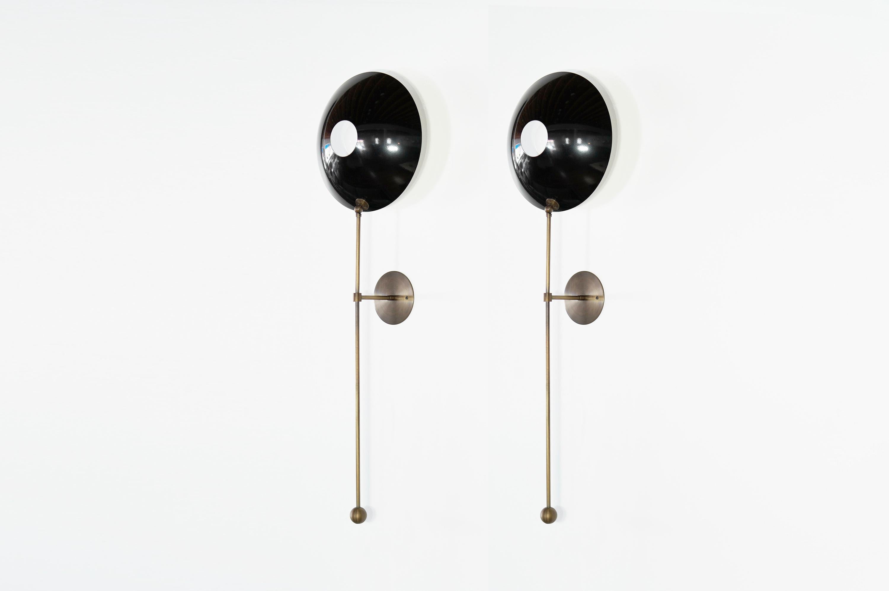 The dramatic POP Wall Sconce in Bronze and Black enamel. This design is influenced by both French and Italian Mid-Century Modernism and is a perfect POP of color and bold design, scaled to work well flanking a doorway in a foyer, behind a bar,