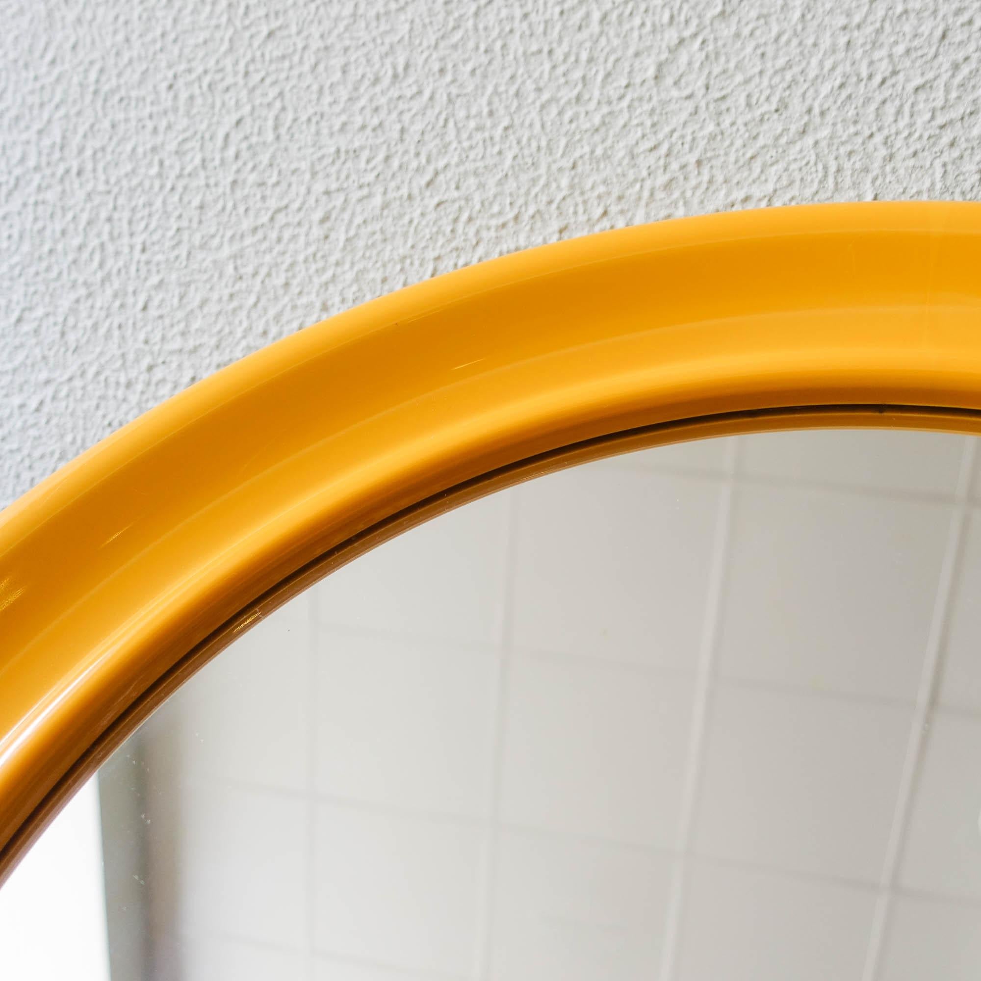 yellow round mirror