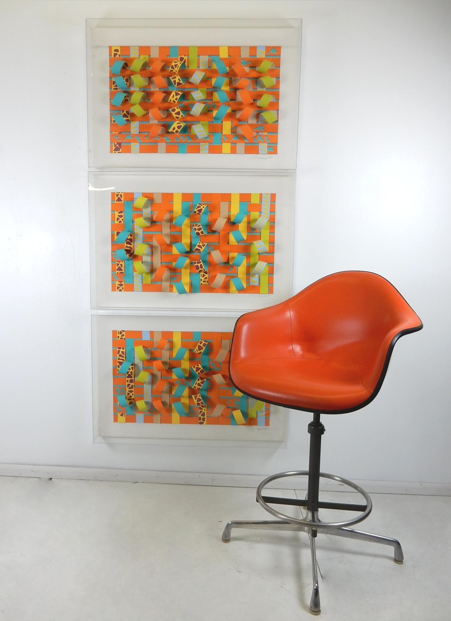 Sofa size Popart paper sculptures in acrylic shadowboxes by graphic artist Greg Copeland.
Brightly colored paper strips looped and woven together and encased in large acrylic boxes.
Each is sighed/dated in pencil by Greg.
Can be hung side by