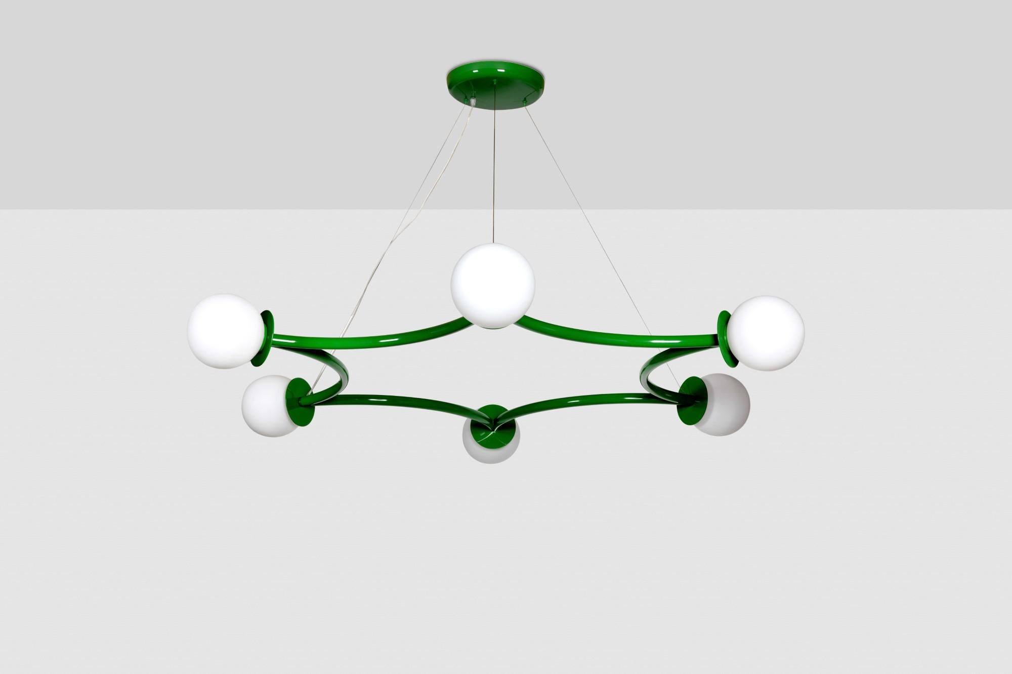 Poppins ceiling lamp by Royal Stranger
Dimensions: W 180 x D 160 x H 20 cm
Materials: Fern green lacquered with glossy finish. Blown glass opal diffuser.

Poppins Ceiling Lamp is a striking constellation describing six concentric light
