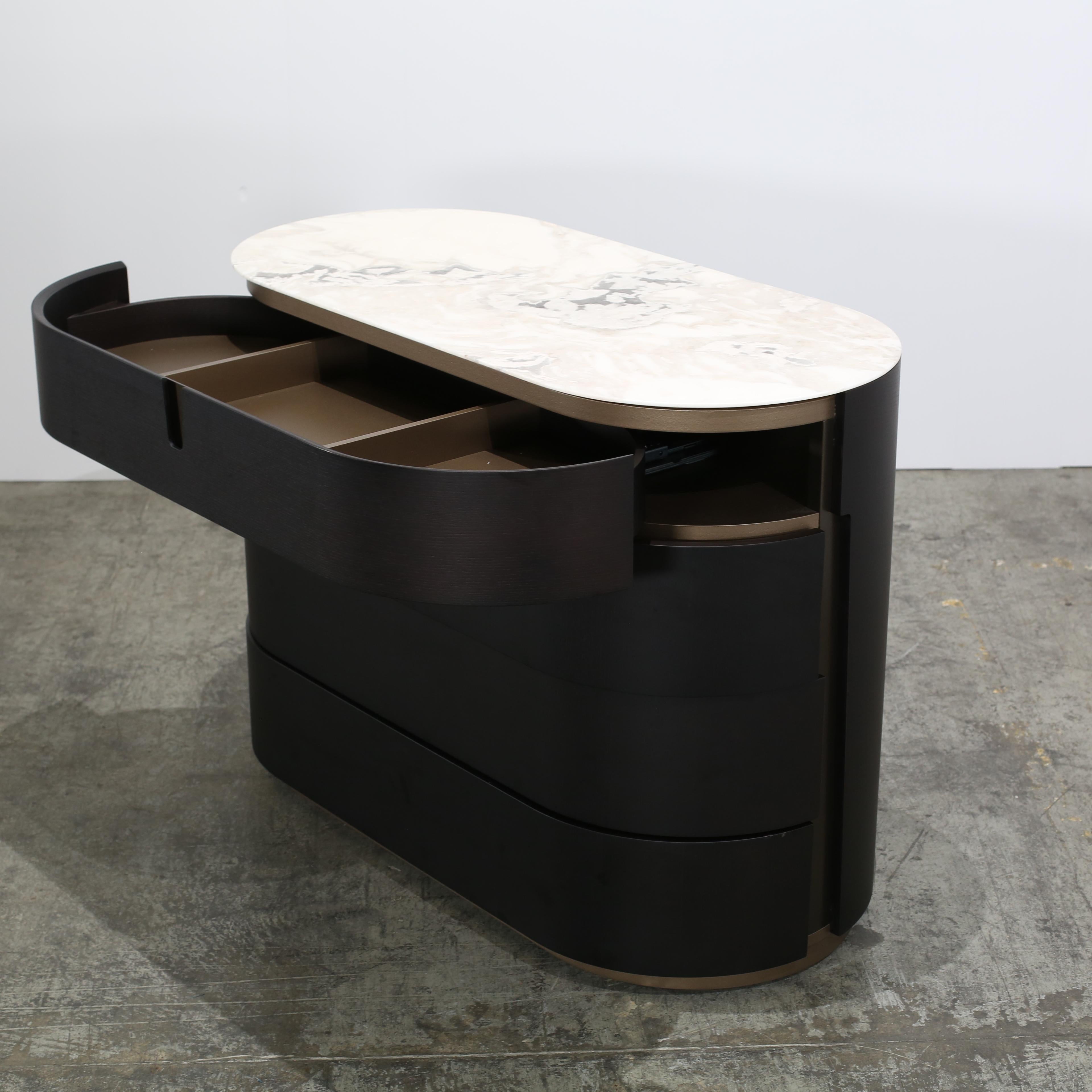 Introducing the Tylsa Chest of Drawers by Porada, a stunning addition to any luxury bedroom. Crafted with high quality materials, this piece boasts a sleek and modern design, featuring a beautiful wood finish and elegant metal accents. With six