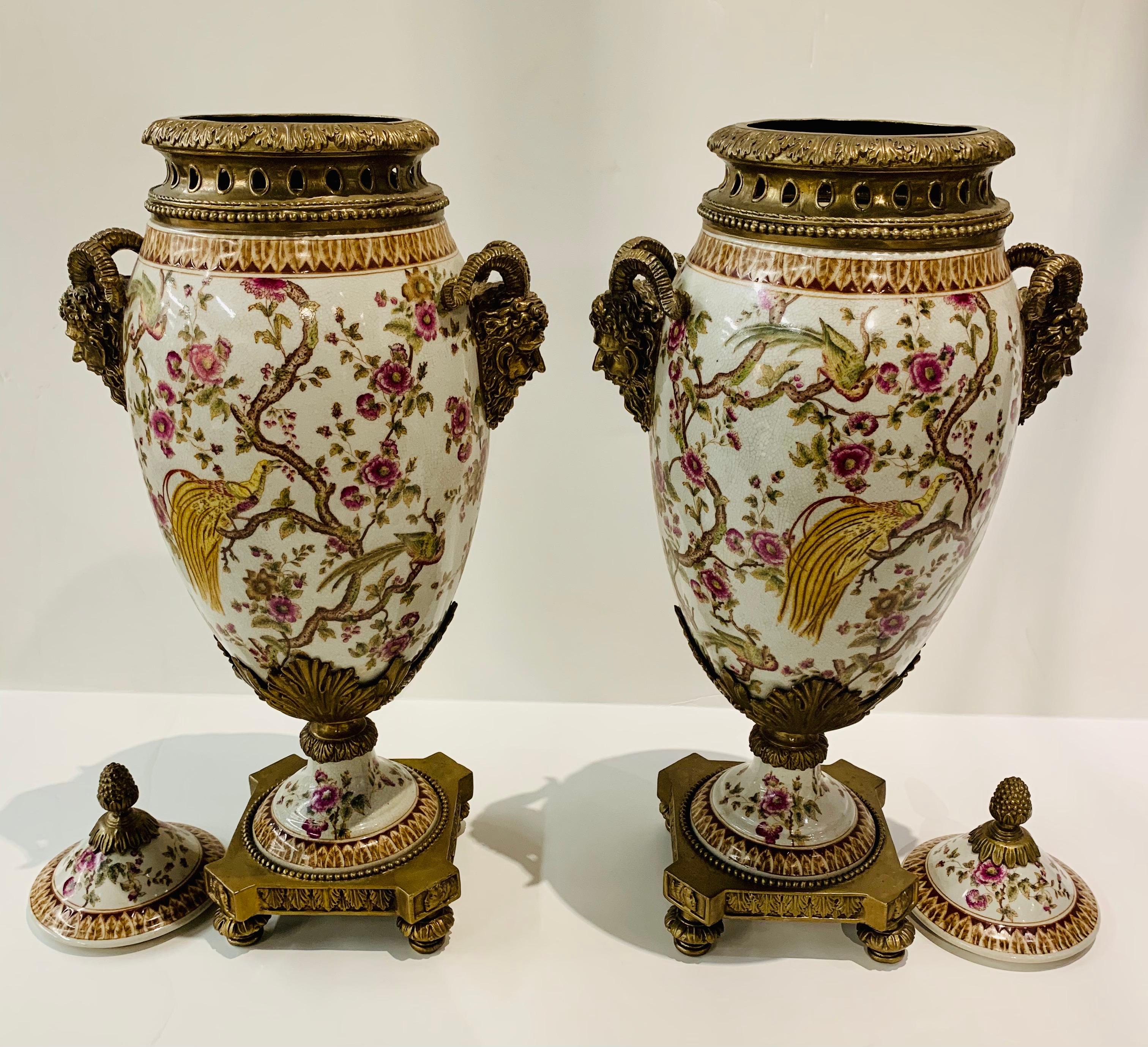 Aesthetic Movement Porcelain and Bronze Covered Urns with Figural Ram’s Head Handles