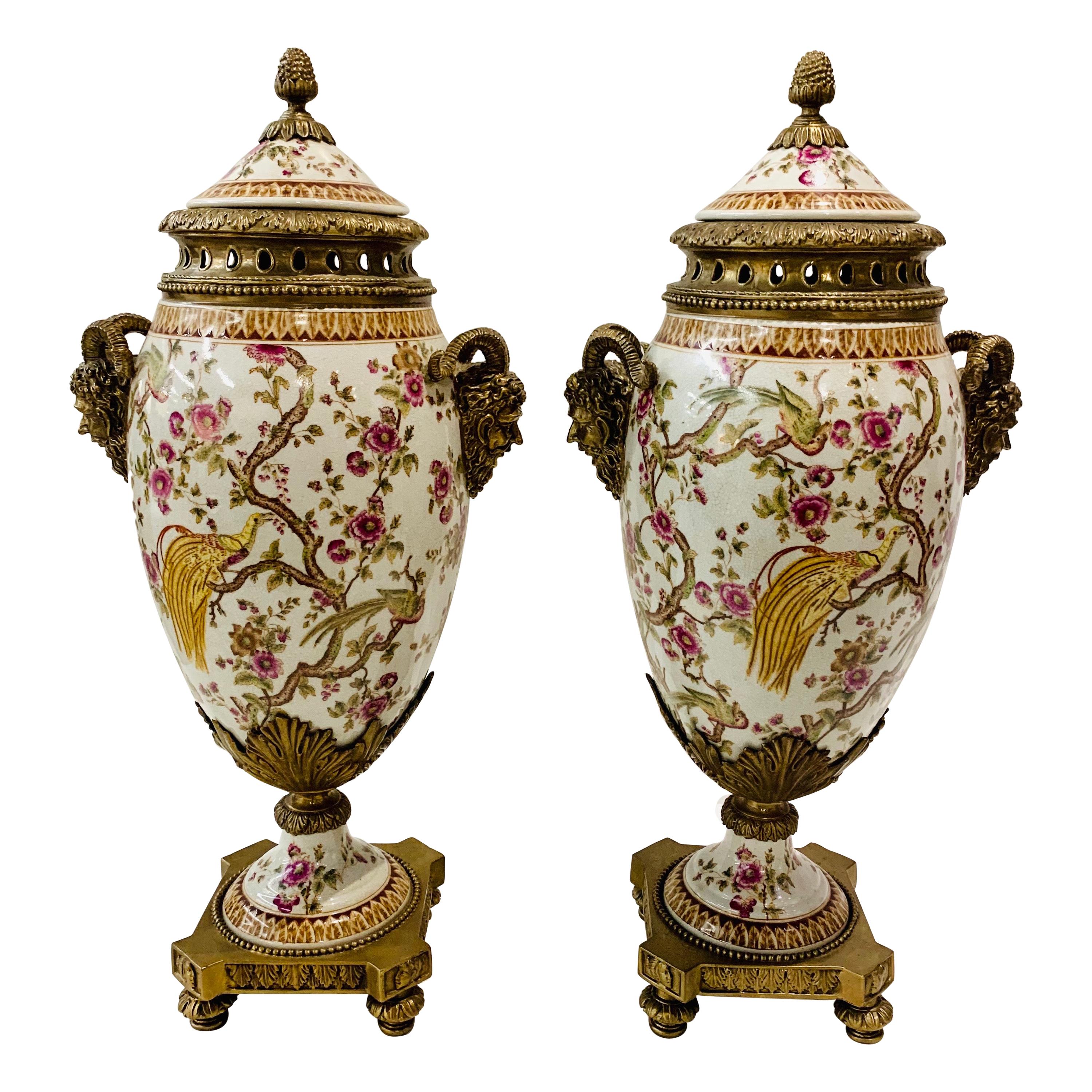 Porcelain and Bronze Covered Urns with Figural Ram’s Head Handles