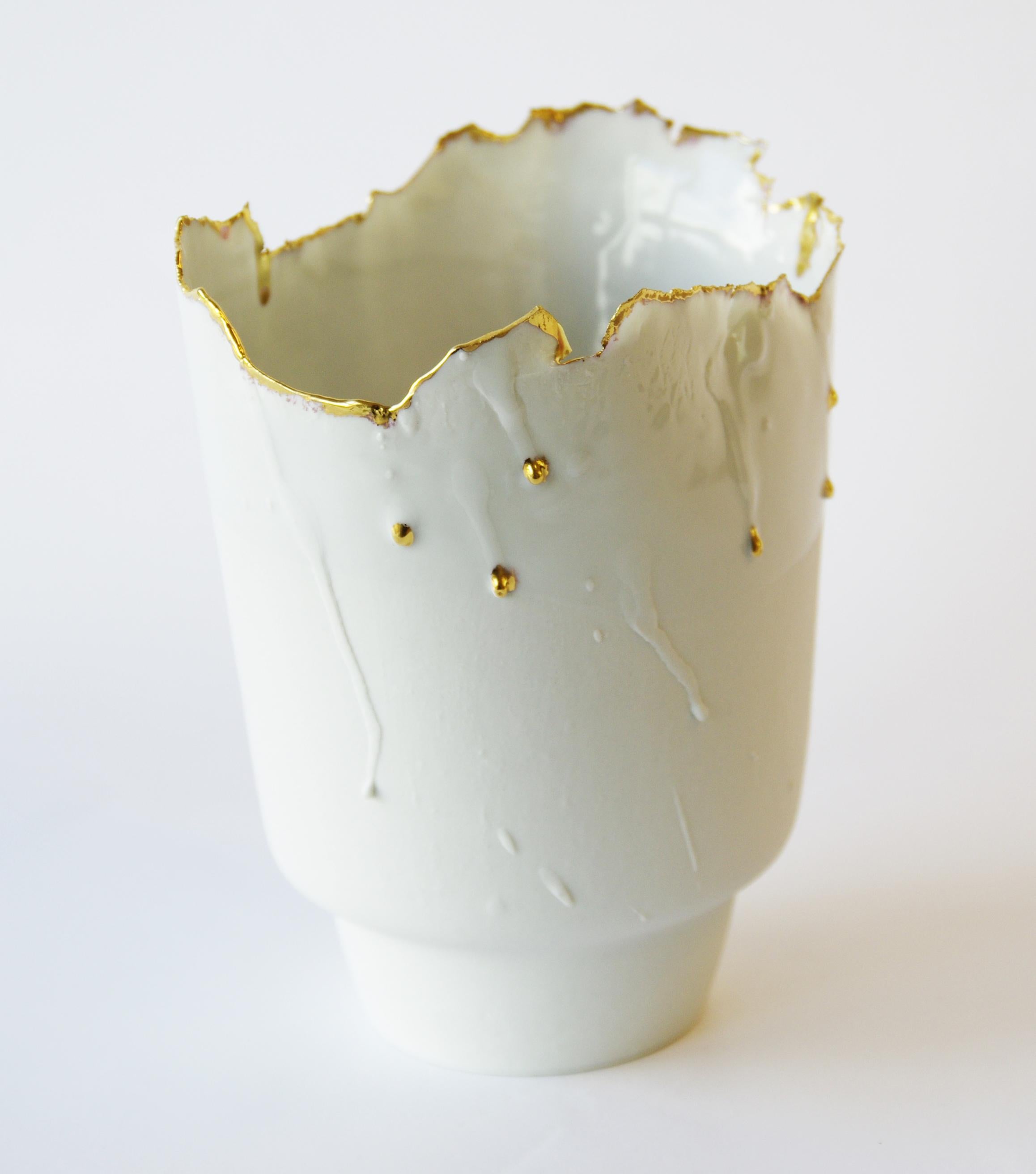 Porcelain and Gold Vase Big Imperfections by Dora Stanczel
One of a Kind.
Dimensions: D 13 x W 13 x H 16 cm.
Materials: Porcelain and gold.

I create bespoke and luxurious porcelain pieces with a careful aesthetic. Beyond the technical mastery of