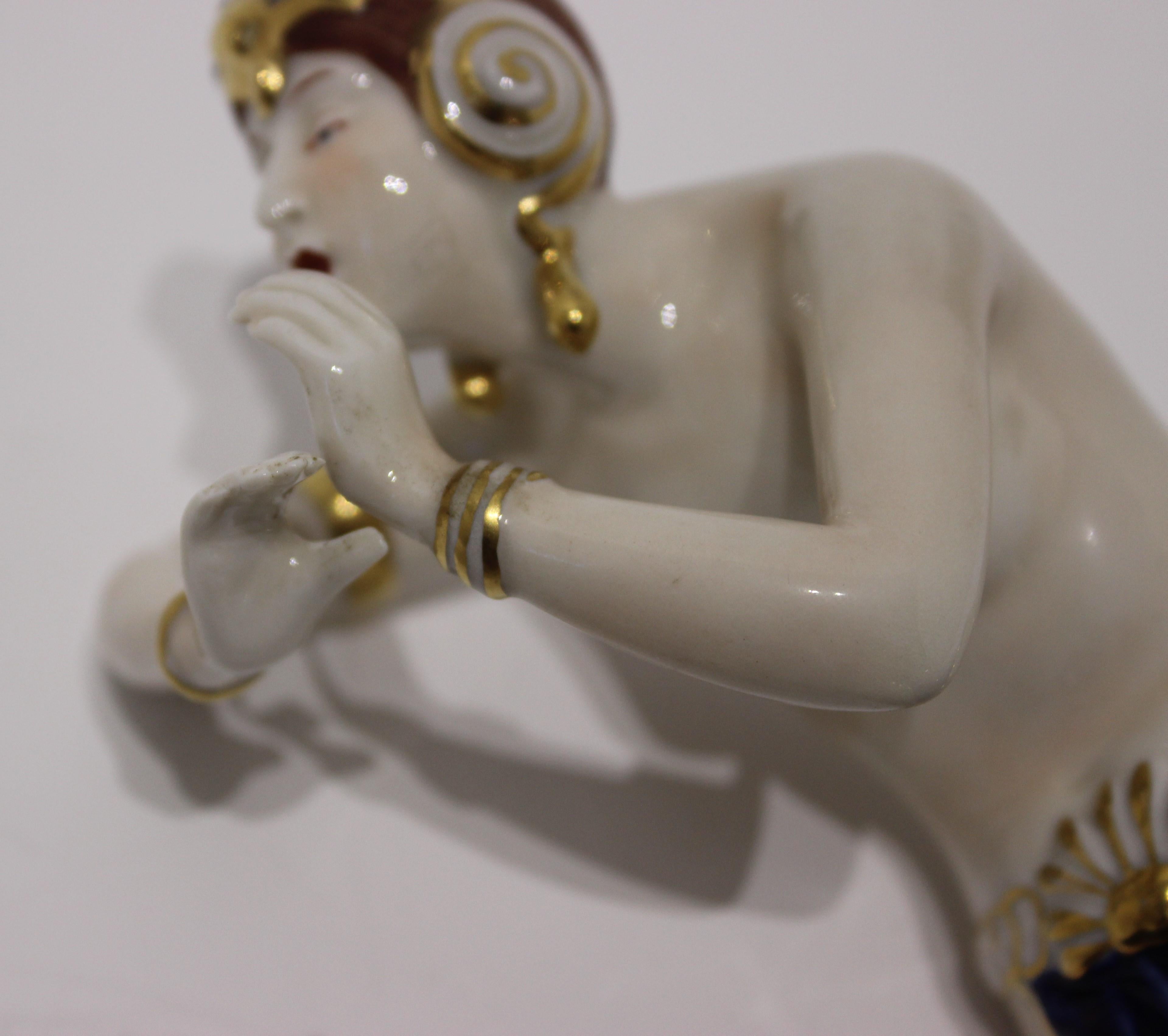 20th Century Porcelain Art Deco Snake Charmer Figurine For Sale