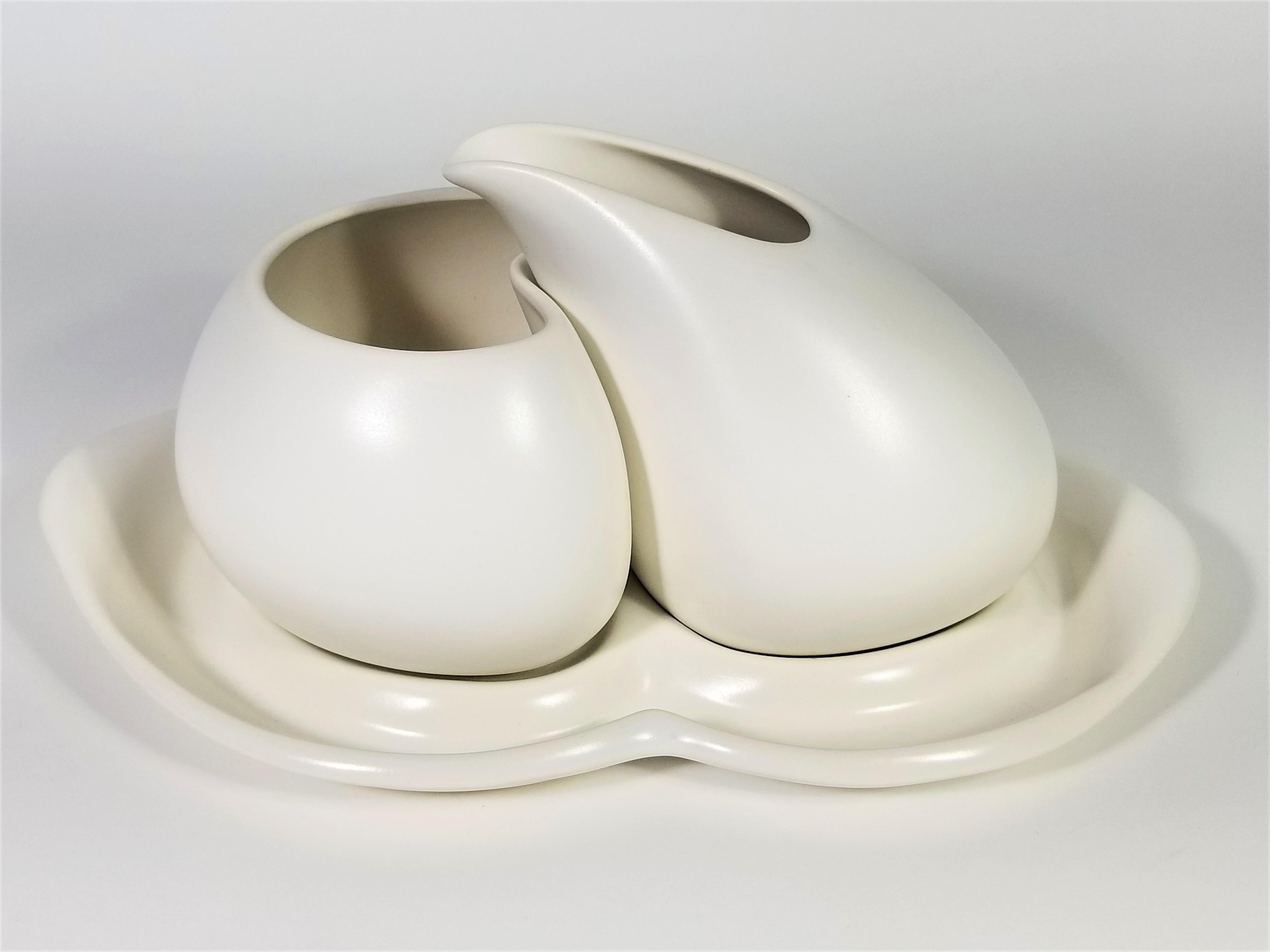 Porcelain sculptural modernist cream and sugar set. Off-white. Artist-signed.