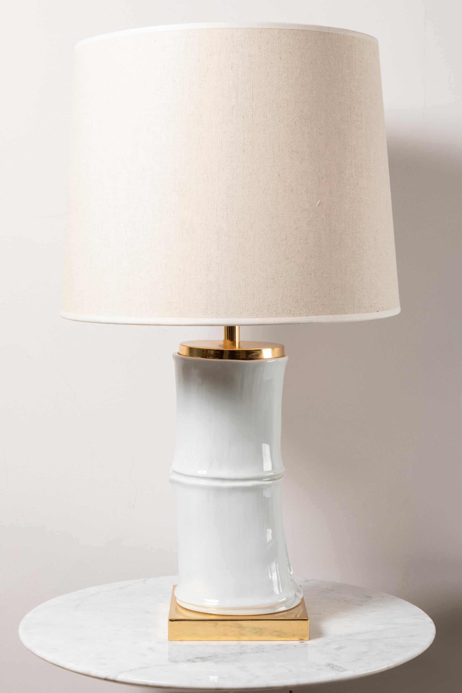 Porcelain bamboo lamp and brass base.
The porcelain by Capodimonte fabric in Napoli, marked.
Italy, 1960's
New shade.

Measures: Height total: 69 cm / 27.1 in. ( adjustable height )
Diameter shade: 40 cm / 15.7 in.