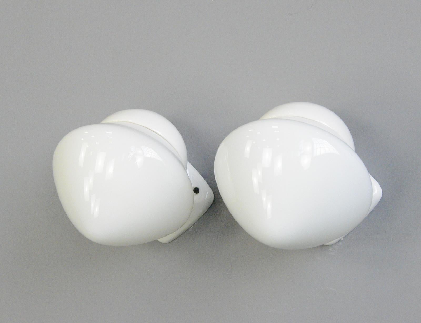 Porcelain bathroom lights by Sigvard Bernadotte for Ifo, Circa 1950s

- Price is per light (12 available)
- All prices inc VAT
- Vitreous white porcelain wall mounts
- Screw off opaline shades
- Takes E27 fitting bulbs
- Wires directly into