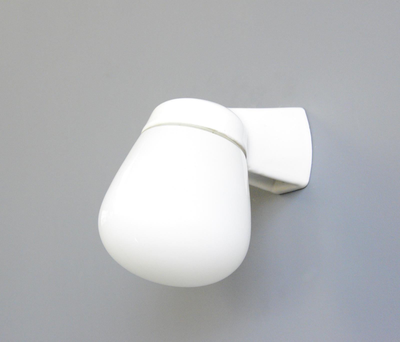 Porcelain Bathroom Lights By Wagenfeld For Lindner Circa 1950s

- Porcelain wall bracket with opaline glass shade
- Takes E27 fitting bulbs
- Wires directly into the wall
- Model 6045
- Produced by Lindner
- Designed by Wilhelm Wagenfeld
-