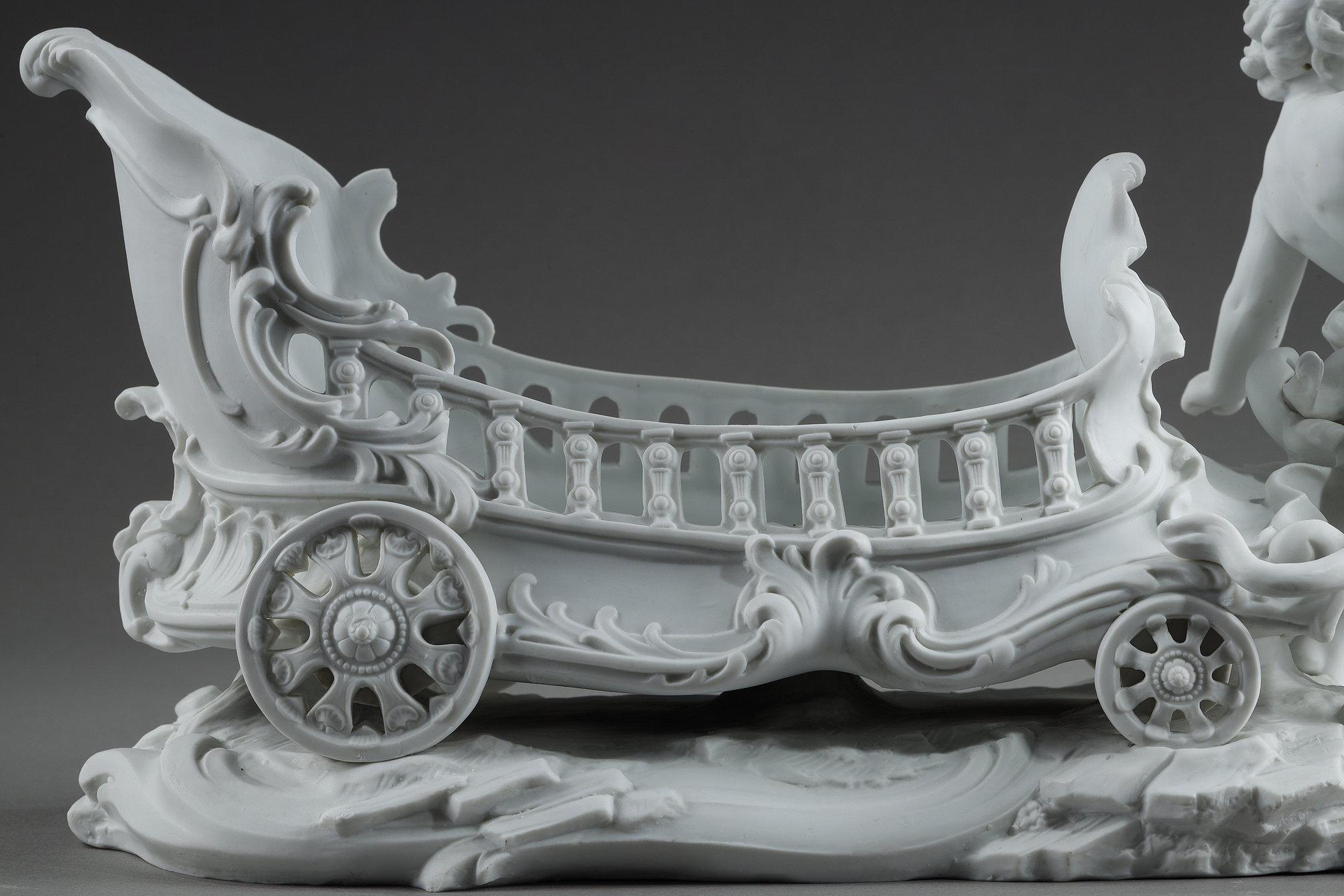 Porcelain biscuit basket decorated with putto and feline, 19th century 11