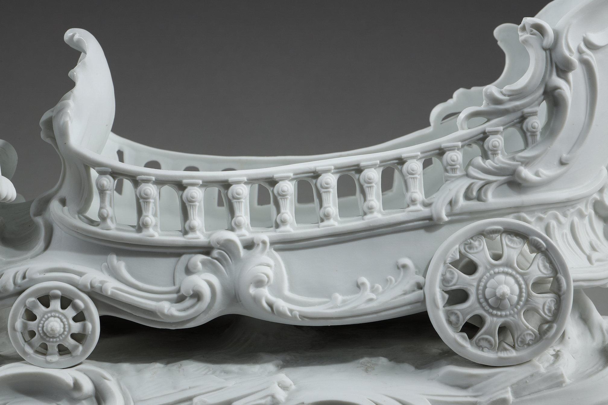 Porcelain biscuit basket decorated with putto and feline, 19th century 12