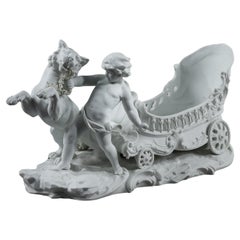 Porcelain biscuit basket decorated with putto and feline, 19th century