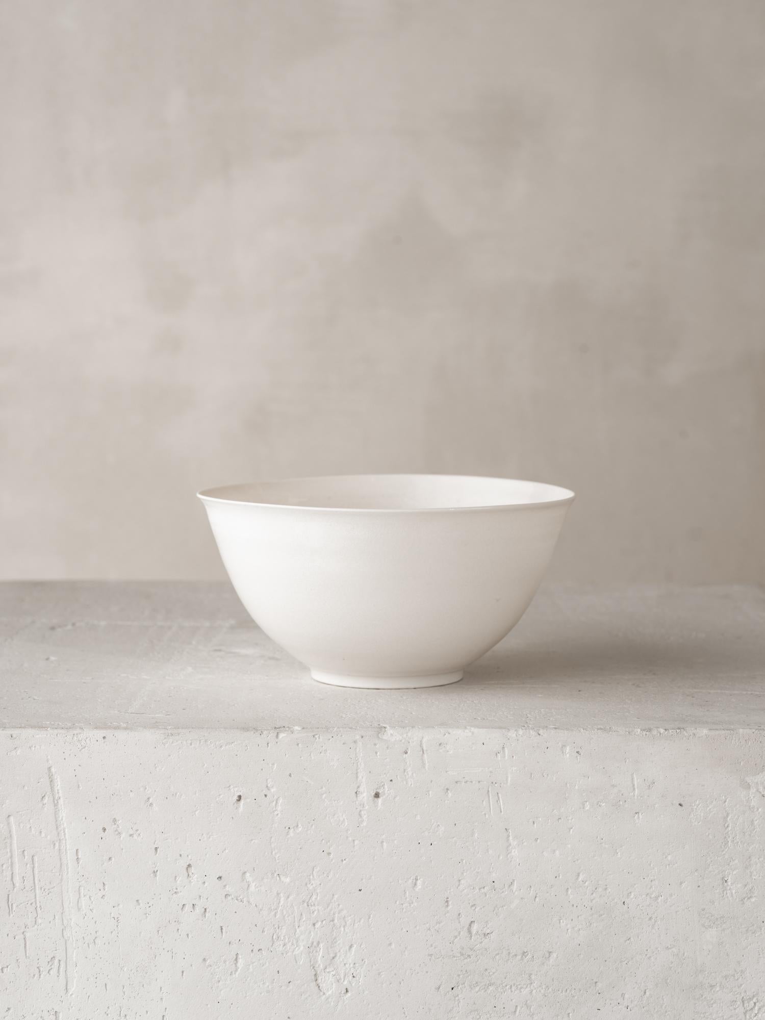 Materials: Wheel Thrown Porcelain

For over forty years Katherine Glenday has been creating meditative ceramic and porcelain pieces by hand in her South African studio. Remarkable in their translucency and luminosity, the porcelain vessel has been