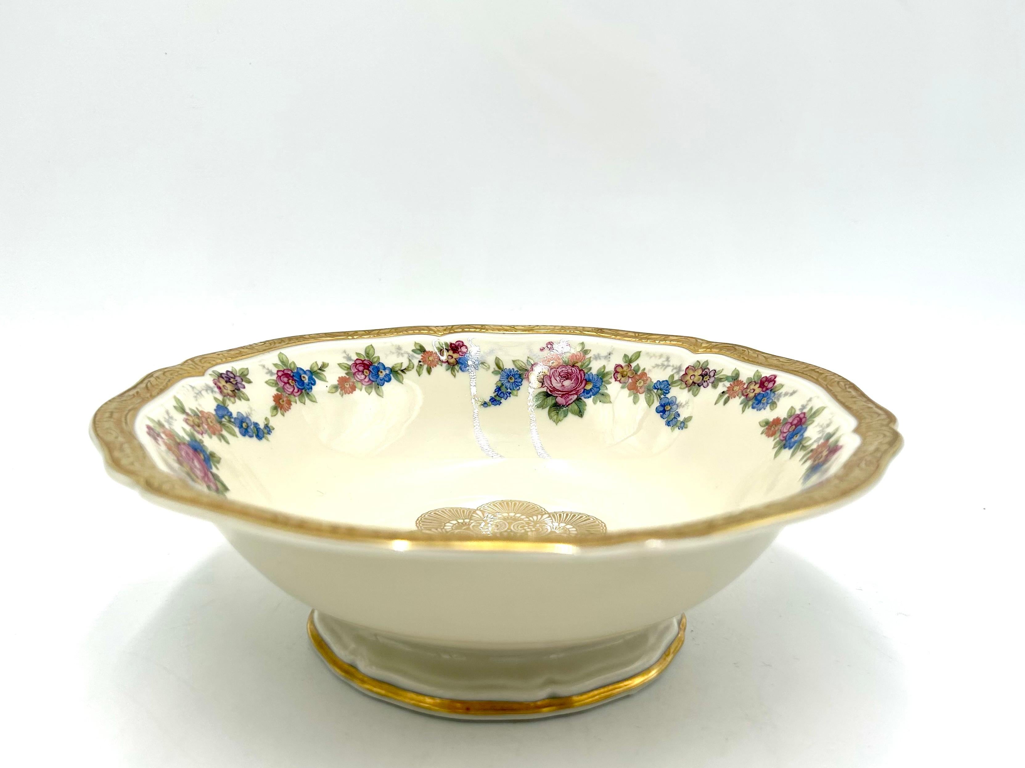 A beautiful cream porcelain bowl decorated with gilding and a floral motif

A product of the valued German manufacturer Rosenthal, marked with the mark used in 1943-1948.

A platter from the classic elegant Chippendale series.

Very good
