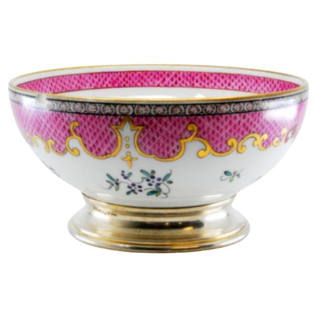 Porcelain bowl with gilded silver base and rim
