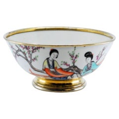Porcelain bowl with Japanese motifs and silver on the rim and base
