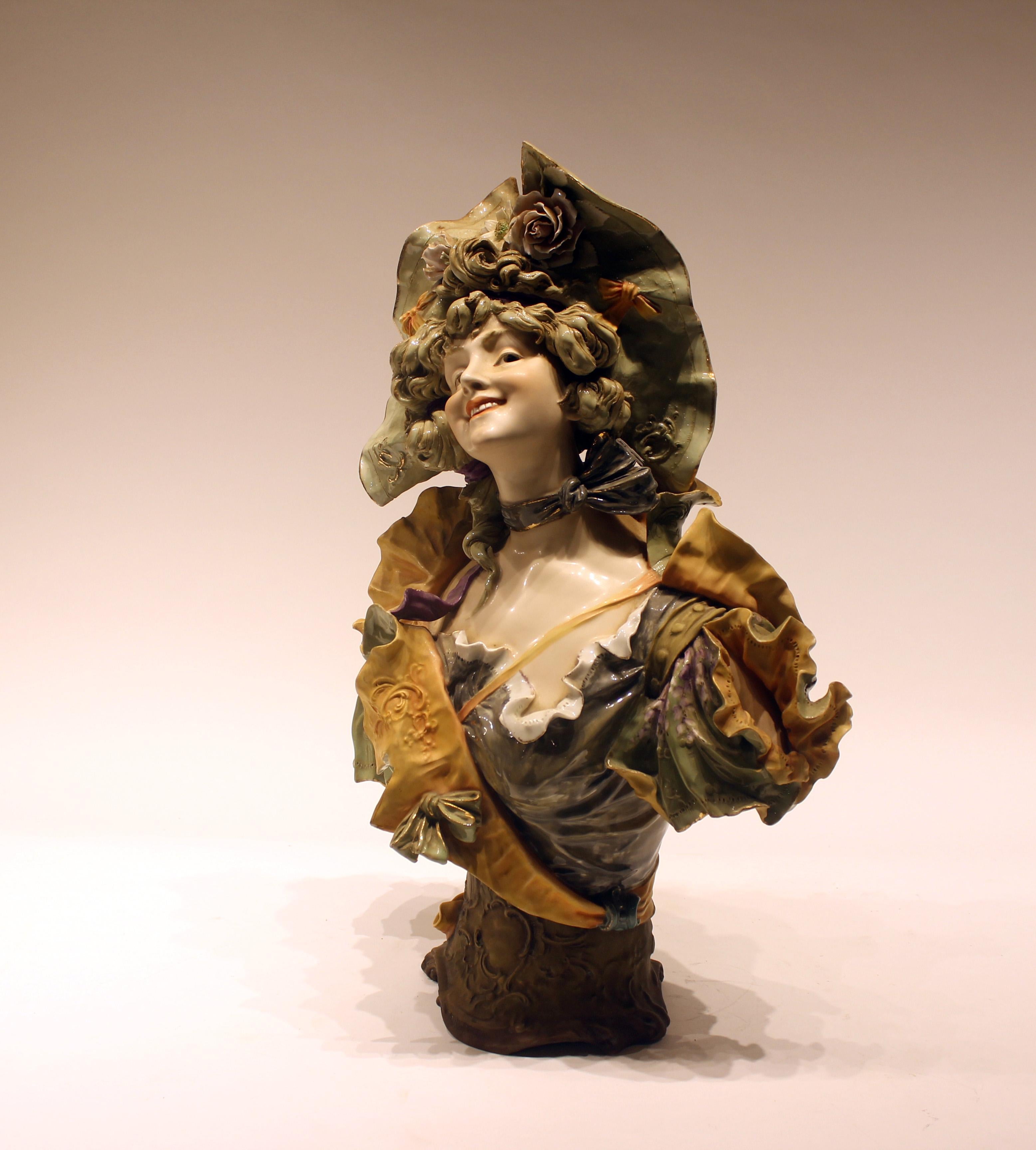 Late 19th century porcelain bust of woman with hat and floral accents most likely Teplitz.