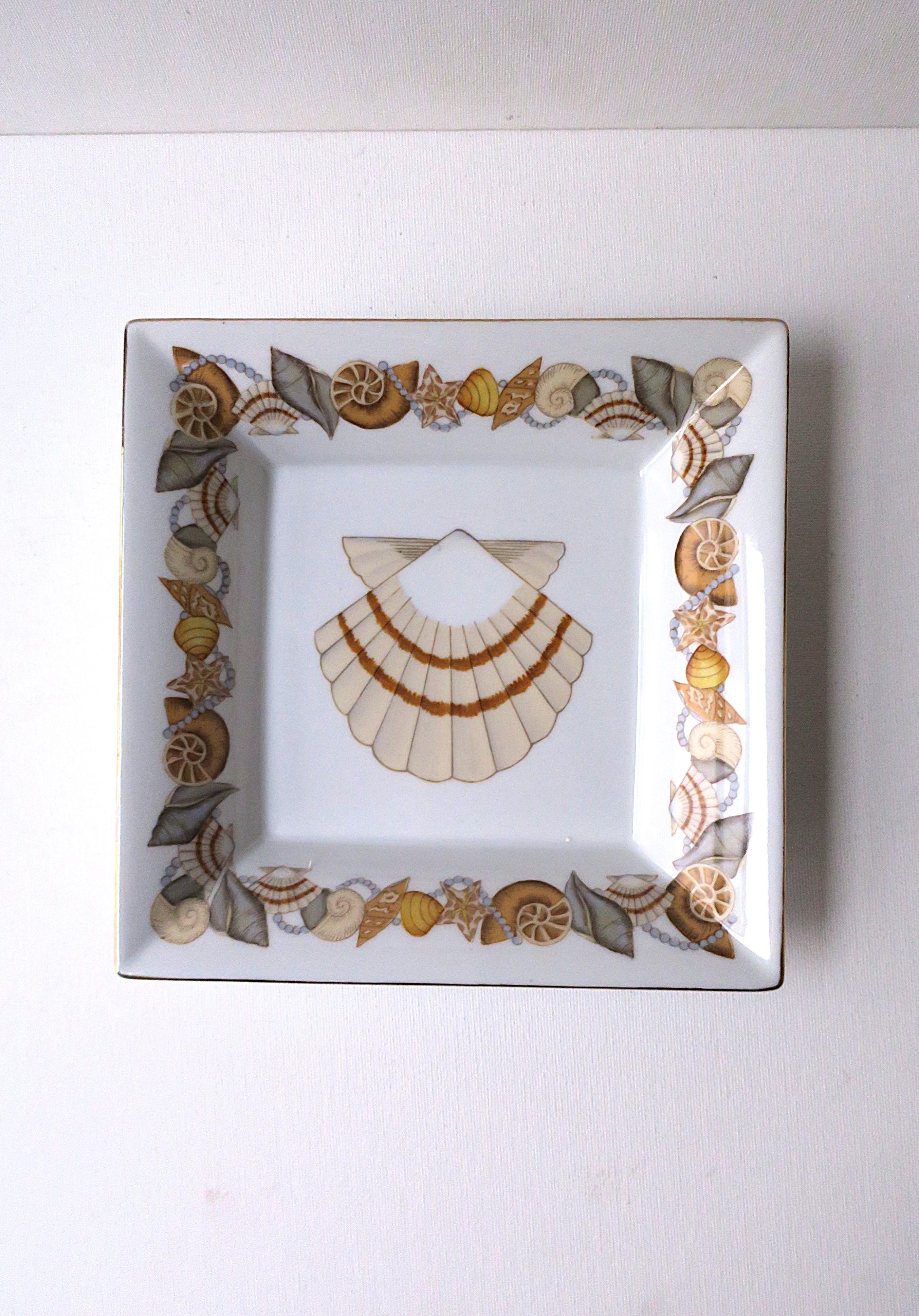 A white porcelain catchall dish with seashells design, circa late-20th century. Excellent condition as shown in images and video. Akoya pearl necklace shown available separately. 