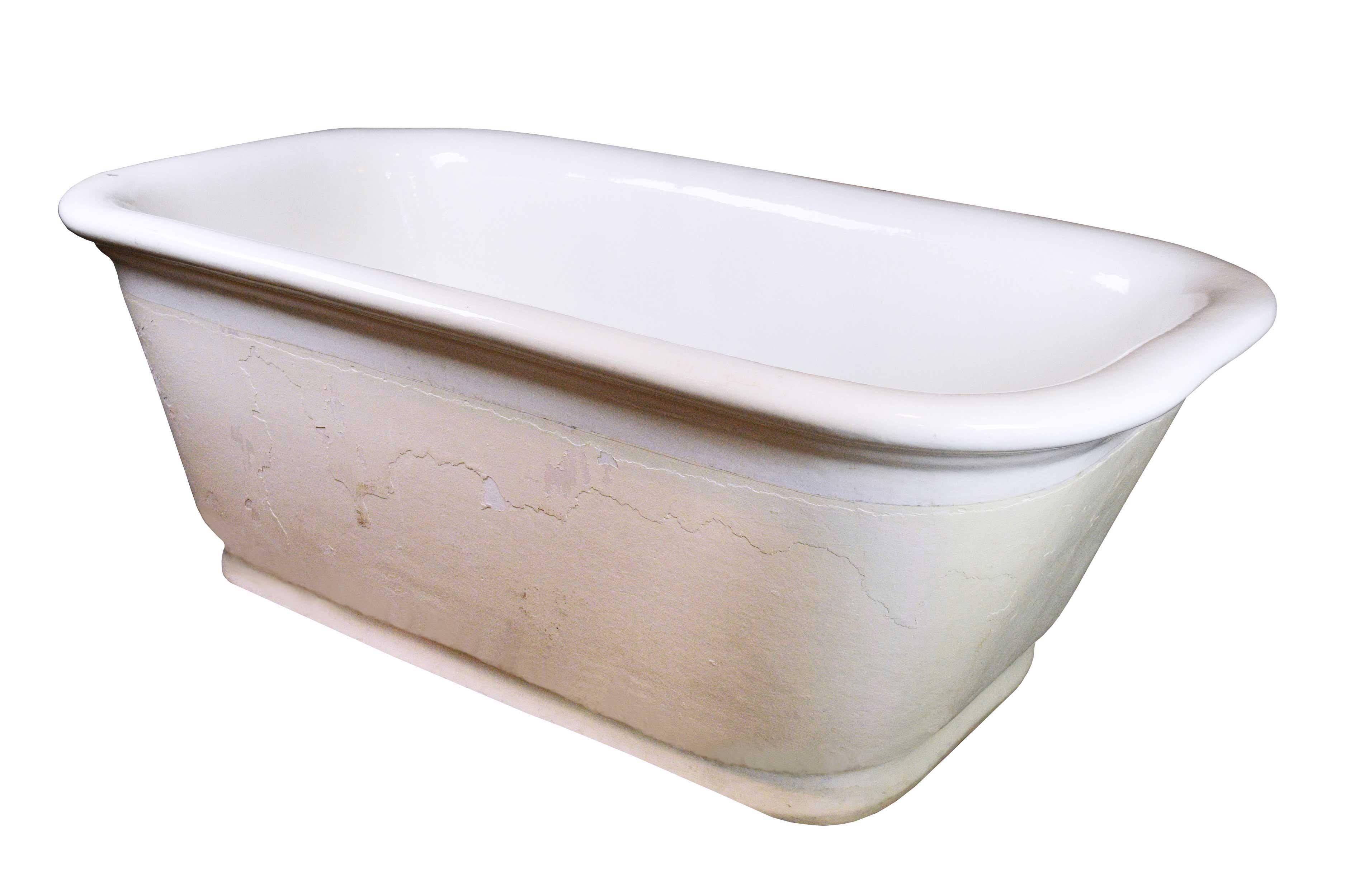 This beautiful porcelain tub was built in the early 1900s by the Trenton Potteries Company. The center drain on this tub was one of its selling features, as it was unique at the time. This timeless tub will add charm to whatever space it