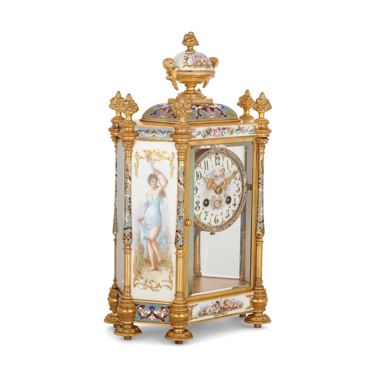 French Porcelain, champlevé enamel, and gilt-bronze Rococo style three-piece clock set For Sale