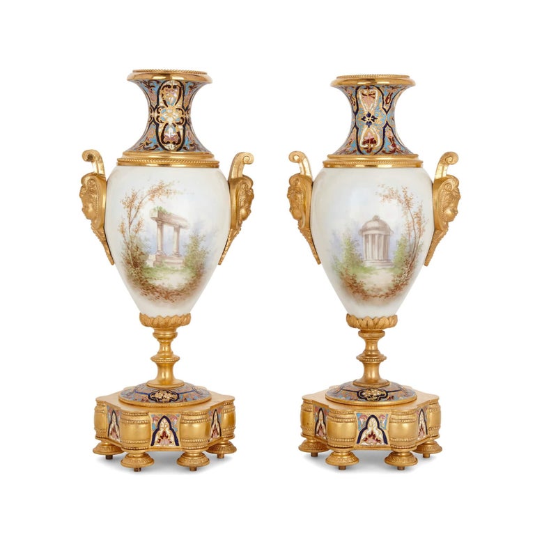 Champlevé Porcelain, champlevé enamel, and gilt-bronze Rococo style three-piece clock set For Sale